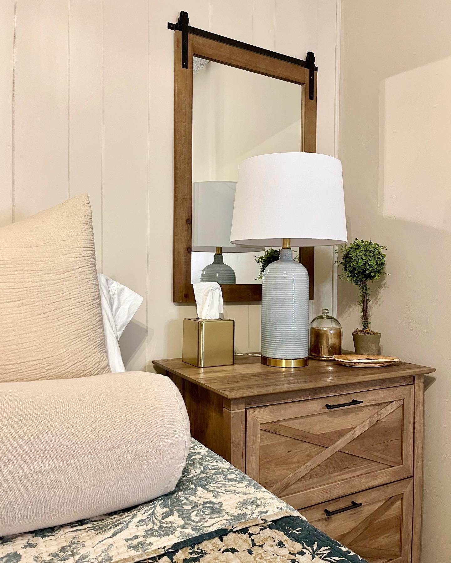 Southworth Interior Design is swooning over how this bedroom refresh turned out. It’s simple, calm, and dual purpose with home office storage features.

Our client uses this space as a guest room but they also keep office supplies such as their printer, internet tower, and important paperwork in this room. To accommodate the functionality of the room, we found the perfect nightstand which also serves as a filing cabinet. A matching bookshelf now displays special keepsakes and an updated printer stand provides extra storage for office supplies.

The client requested a tan paint with blue accents. We painted the walls Accessible Beige by Sherwin Williams and added pops of blue with the reversible quilt and ceramic table lamp.

rise + SHINE ☀️ 
Southworth Design

#LTKsalealert #LTKhome #LTKfindsunder50