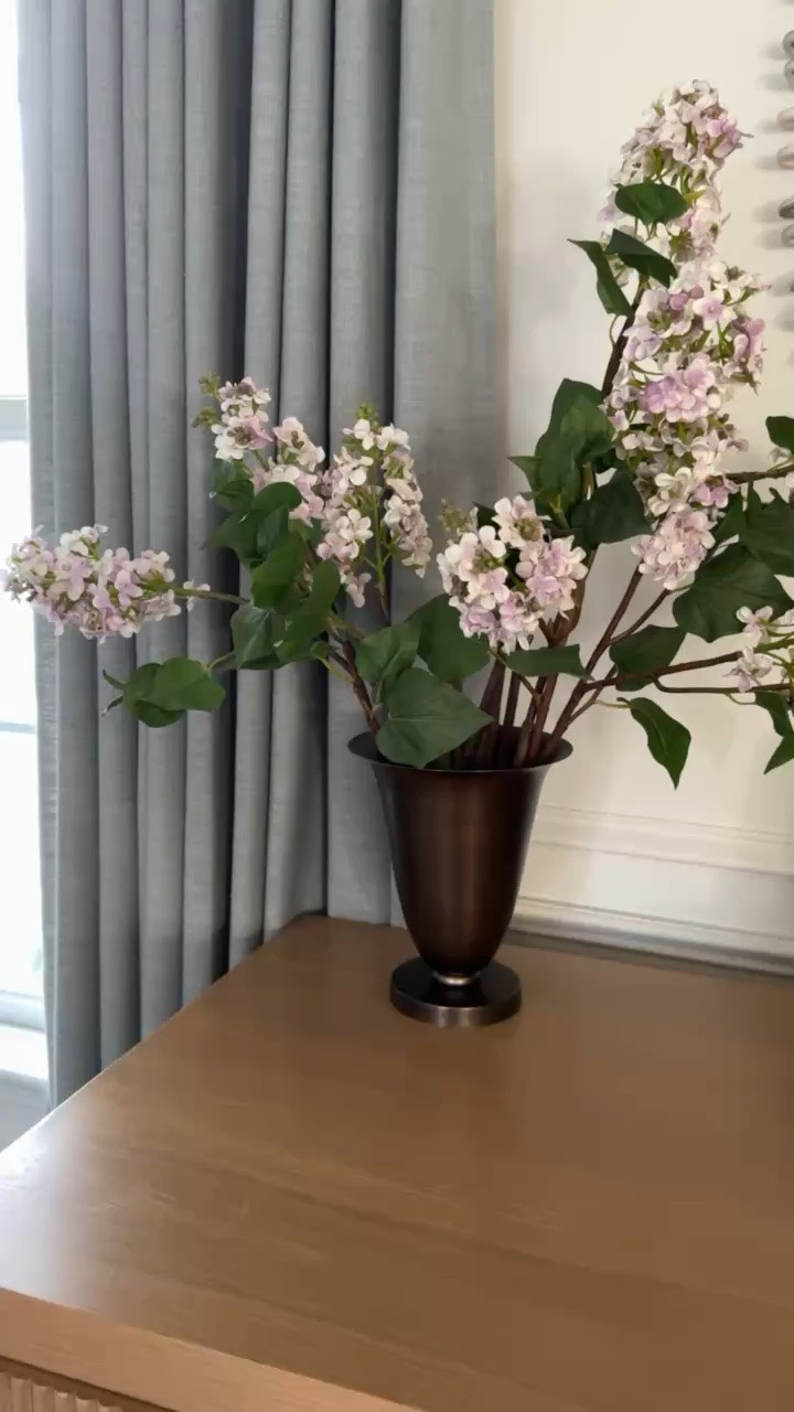 These faux lilacs are such an easy way to bring a little color into a room, and I love that they look good year round with zero maintenance.

faux lilacs, artificial flowers, faux florals, floral stems, home decor, spring decor, summer decor, vase styling, flower arrangement, girlonthehudson

#LTKHome #LTKSeasonal #LTKOver40