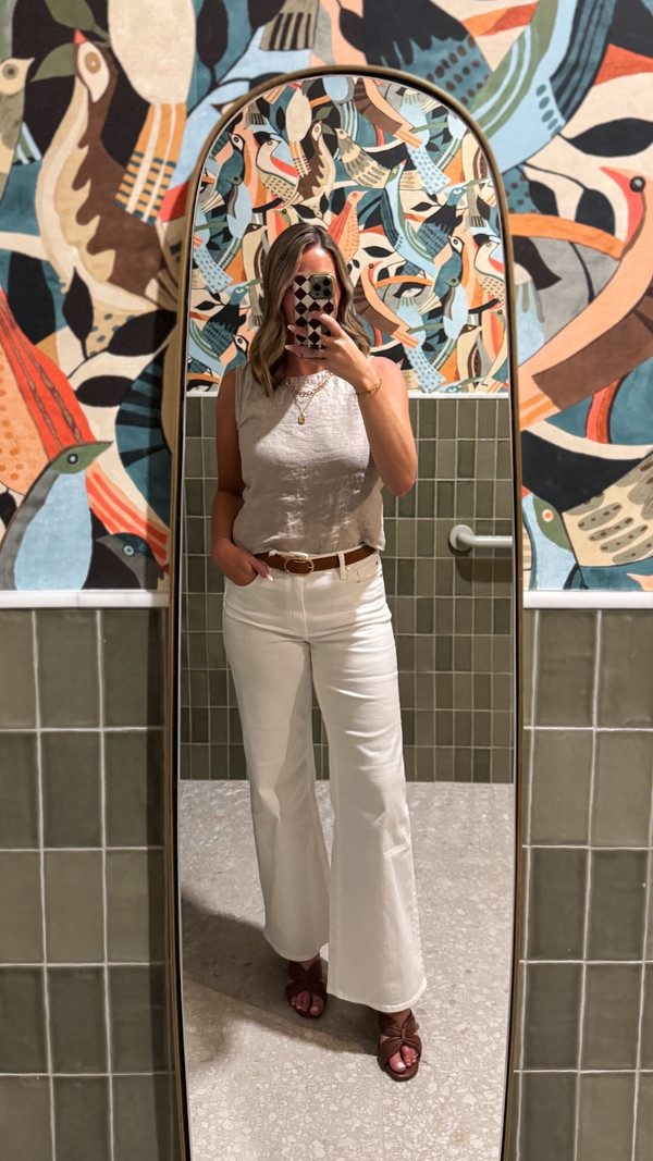 Wearing my favorite $50 white wide-leg denim jeans from Quince paired with their…