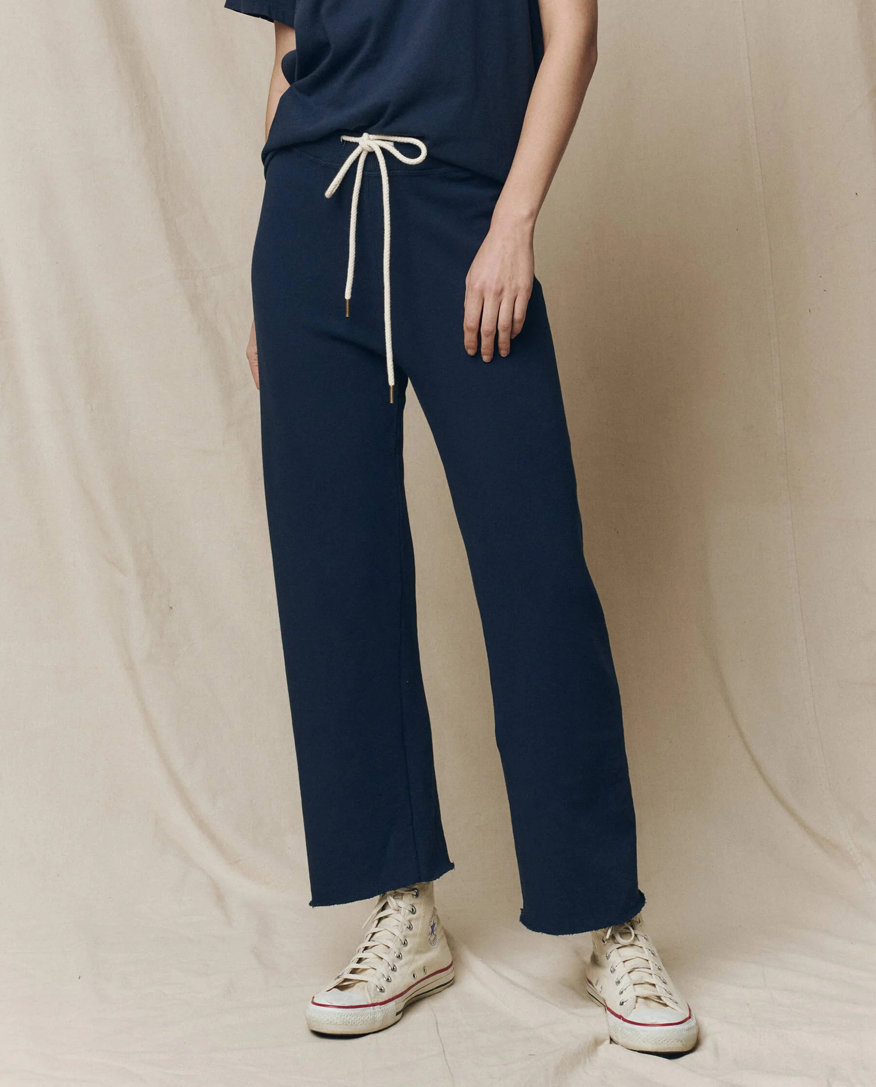 The Wide Leg Cropped Sweatpant. -- True Navy | THE GREAT.