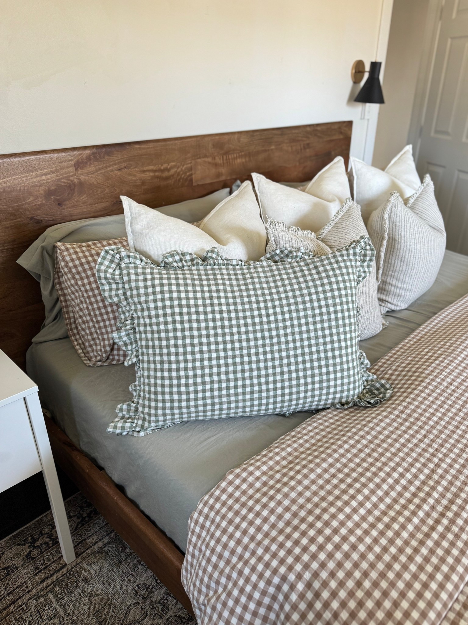 Gingham pillow cases with ruffles 😍 love love these!!! I did the standard size for the pillow I sleep on. You can also do euro sham and other sizes — the ruffles so cute!!! Love the sage green in our bedroom 🤍

Amazon finds, spring bedding, new bedding, spring refresh, bedroom refresh, gingham and ruffles 

#LTKSeasonal #LTKHome #LTKFamily