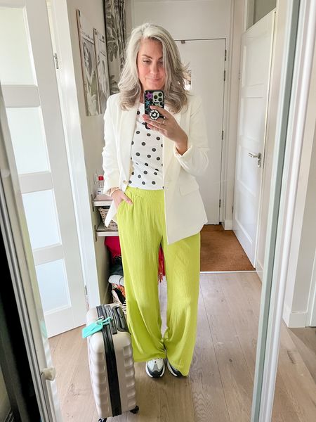 Outfits of the week

Travel day! Flying out to London to meet up with my tall girls 🩷

Wearing comfy lime green plissé pants paired (local boutique) with a polka dot t-shirt (old) and an off white tall blazer. 

And comfortable Skechers sneakers ofcourse. 

#LTKstyletip #LTKeurope #LTKtravel