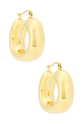 petit moments Chubby Hoop Earrings in Gold from Revolve.com | Revolve Clothing (Global)