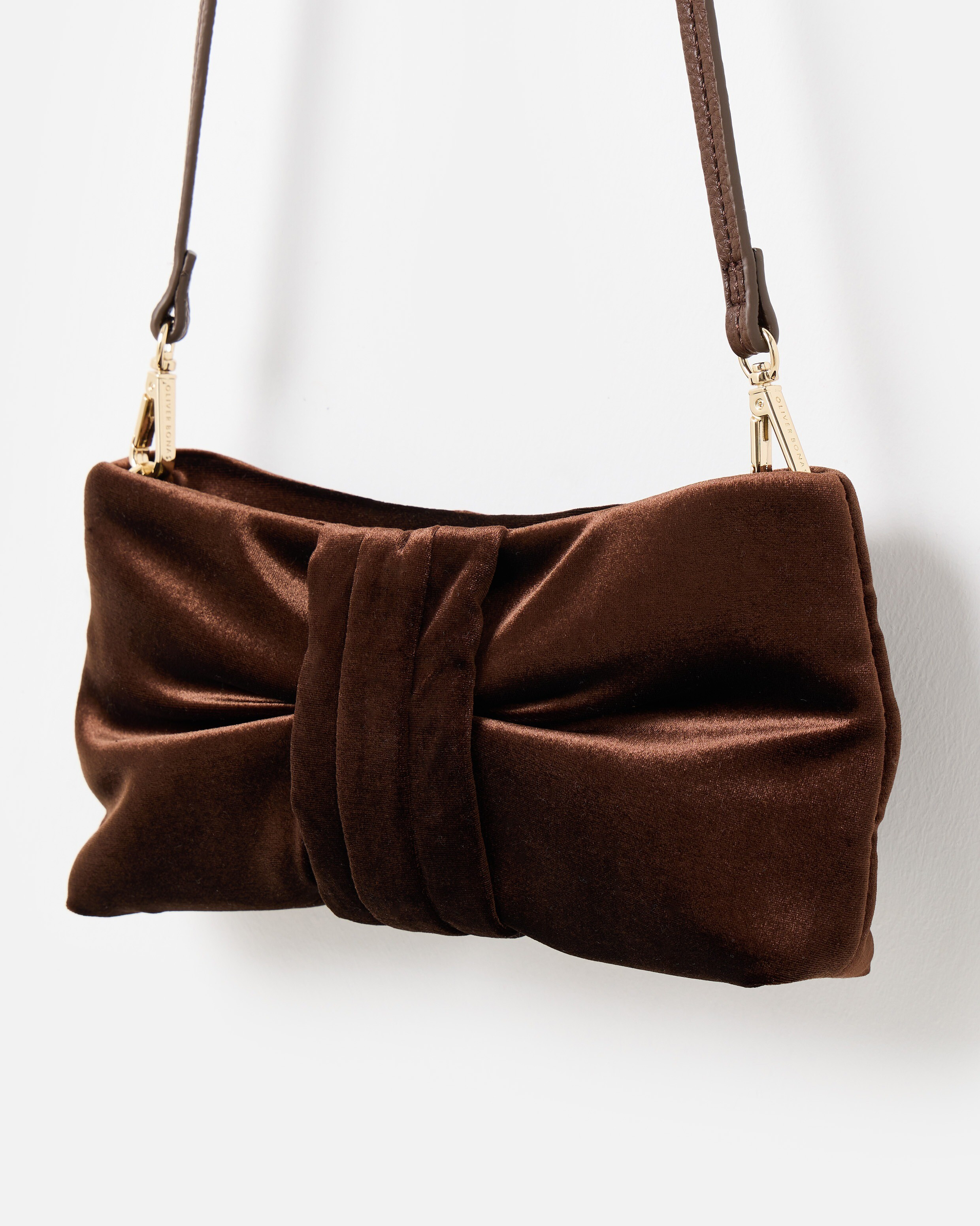 Tina Chocolate Brown Bow Velvet Clutch Bag | Oliver Bonas | Oliver Bonas (Global)