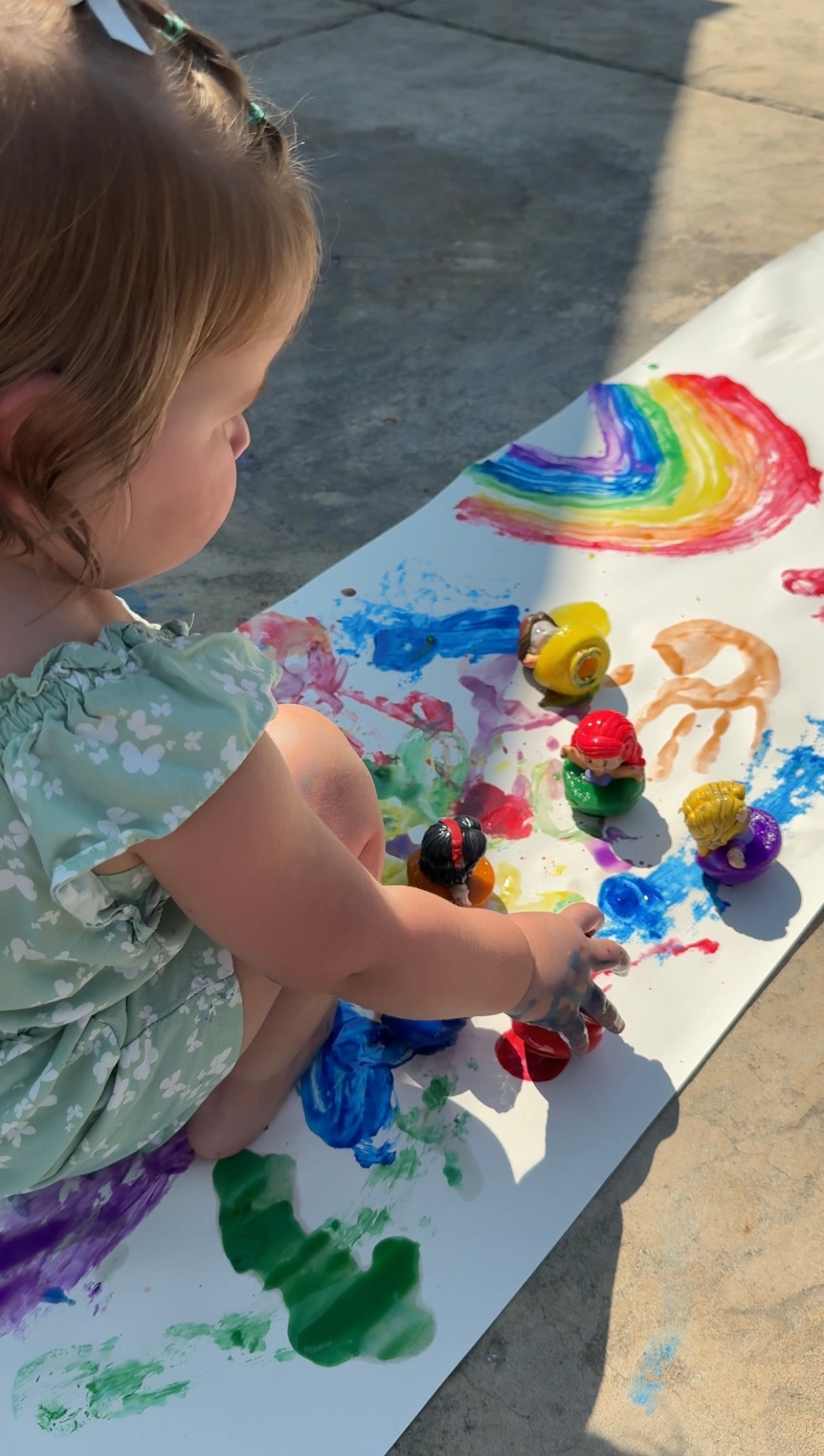 Toddler Activity: Little People Ice Painting! 🌈👸🏼🧊

Did you know your Little People figurines make the best paintbrushes? 🎨 They’re just the right size for tiny hands—and make painting extra magical! ✨

I mixed some @crayola washable paint with a bit of water, added in our favorite @fisherprice Princess Little People 👑, and froze them overnight ❄️. In the morning, we grabbed some paper and let the painting fun begin! 🖌️

Macy loved watching her little princesses skate across the paper as the ice melted ⛸️💧. She even painted her hands and made adorable handprints—her artwork turned out so sweet! 🖐🏼🖼️

This is such a fun sensory activity too—the icy cold feel, the melting water, and all the colorful streaks 🌬️🌈.

Heads up: Macy did try to eat one 😂 (it does look like a popsicle 🍭), but a quick redirection back to painting did the trick. ✅

Definitely add this one to your summer activity list! 🧊☀️💕

#toddlersummer #toddleractivities #diytoddleractivity #creativeplay #easytoddleractivity #frozenpaint #creatorsearchinsights

#LTKSeasonal #LTKKids #LTKFamily