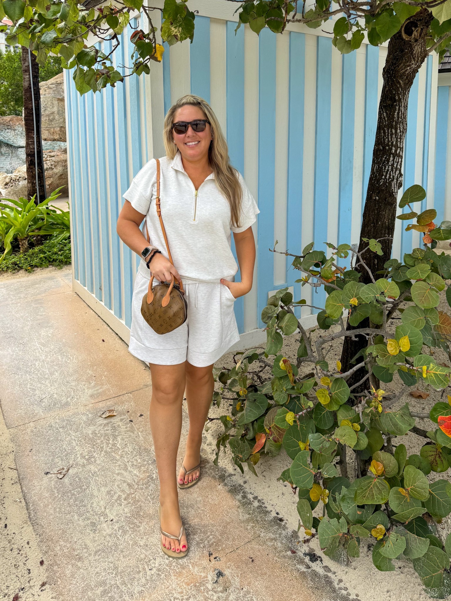 I can’t get enough of these Varley short sets! The 5.5” inseam is perfect for taller gals (I’m 5’9”) and this material couldn’t be softer! I’m a Varley convert! This short sleeved top has finally been restocked too! I’m wearing a large in the top and XL in the shorts. I paired it with these Target sandals (fit true to size) and my favorite Louis Vuitton seashell purse.   #ltkover40 #ltkmidsize #ltktravel #ltkfindsunder100 #ltkfindsunder50 #ltkshoecrush #ltkseasonal #ltkitbag travel outfit idea, lounge set, spring break travel clothes

#LTKFindsUnder100 #LTKMidsize #LTKTravel