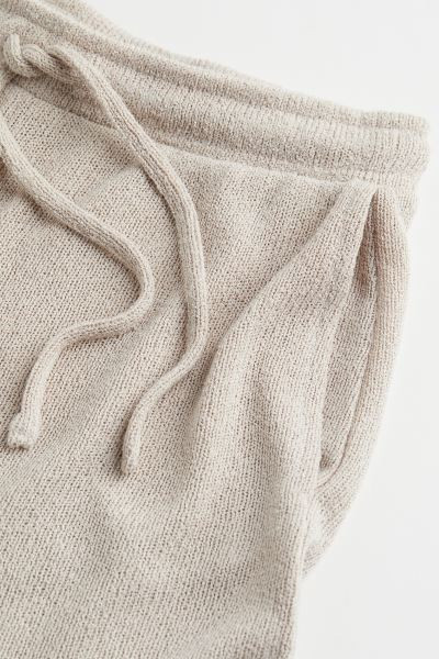 Shorts in a soft, fine-knit viscose blend with covered elastication and a drawstring at the waist... | H&M (US + CA)