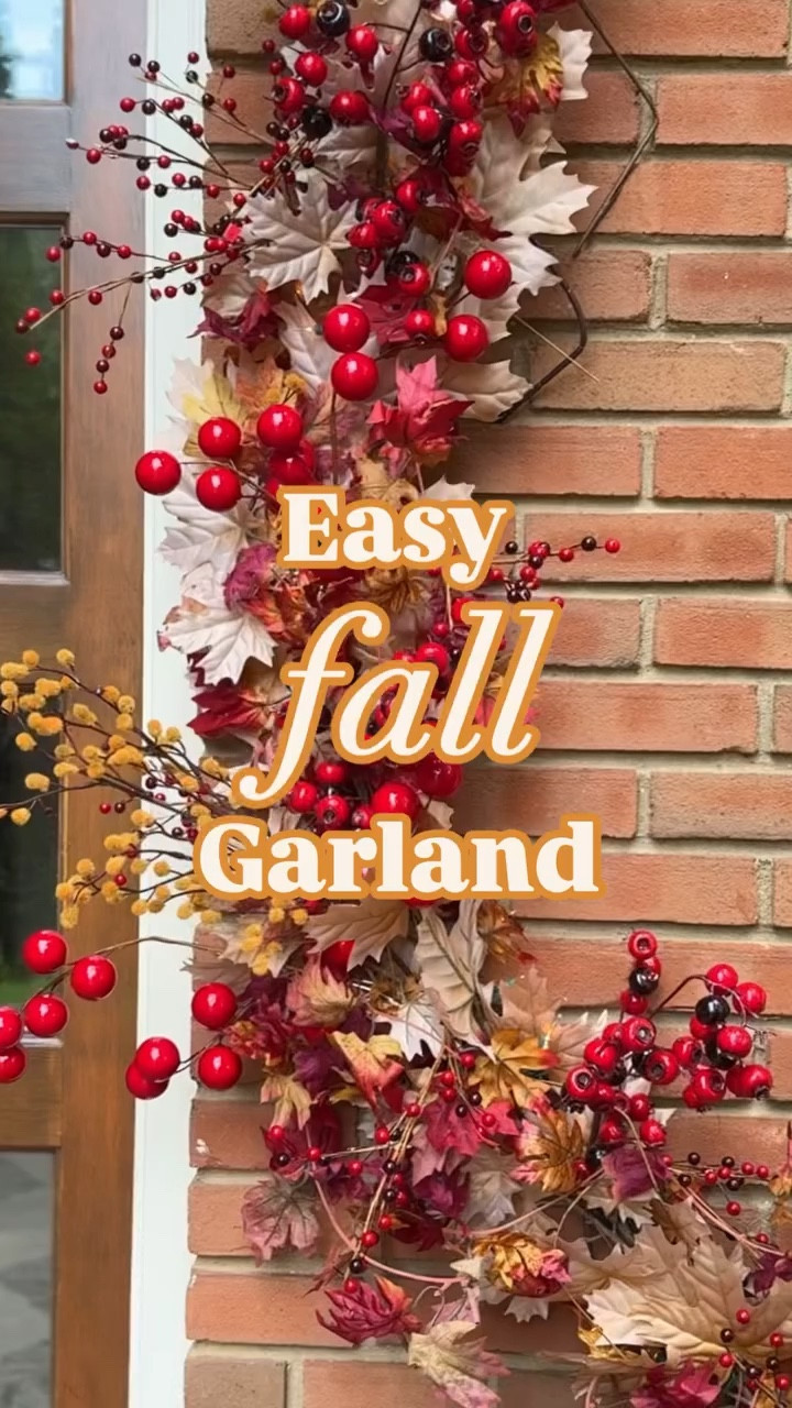 That glow at the end 🍁🍂This was so fun to make and shockingly simple. 

Here’s how to DIY your own fall door garland:
• Use a thick leaf garland as your base (I used 2 for length)
• weave some Christmas lights between the leaves for a subtle glow (I used 200 total lights)
• add a garland of leaves in another color
• hang up and add berries/floral picks. 

This was my first time using these brick clips and they held up shockingly well. 10/10, my husband is thrilled that I didn’t drill into the brick 🙃 and playing with the clip placement allowed me to make it look more like an overgrown vine. 

#falldecor #falldecorations #fallporch