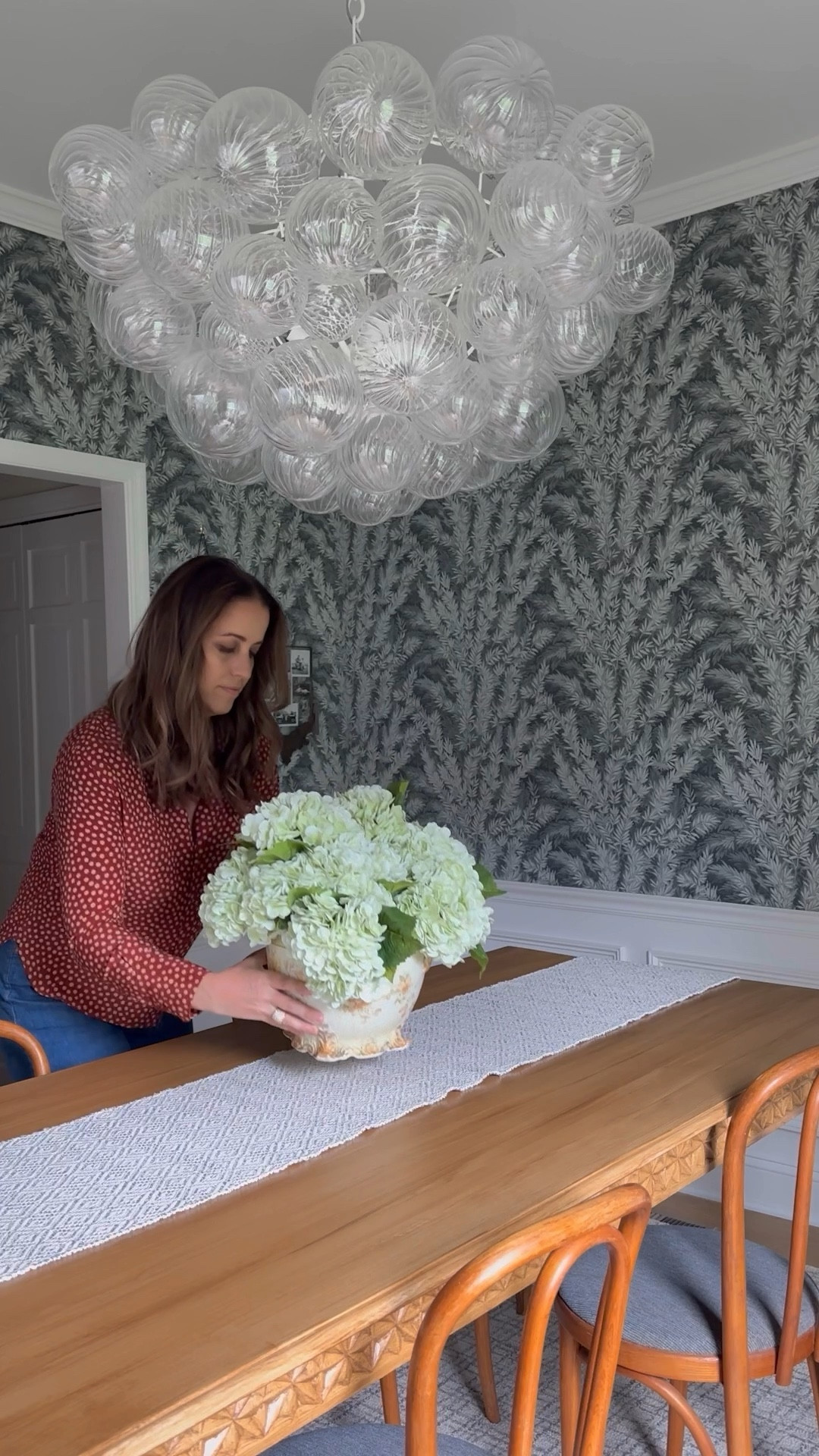 Let’s freshen up the dining room with some new décor #gifted from @alicelanehome  One of my favorite ways to style a space is mixing old with new. I feel like it creates a struggle for the eye but creates this visual interest that pulls you into a space even deeper. For example, this vintage planter that’s cracked and has the most perfect patina, paired with these fresh limelight hydrangeas. Or the burled wood tray stacked with design books and a candle vignette adjacent to the antique French bouillotte lamp. Not everything needs to be new, and not everything needs to be an antique. Strike a balance, and strike curiosity. #homedecor #alicelanehome

#LTKVideo 

#LTKHome #LTKStyleTip