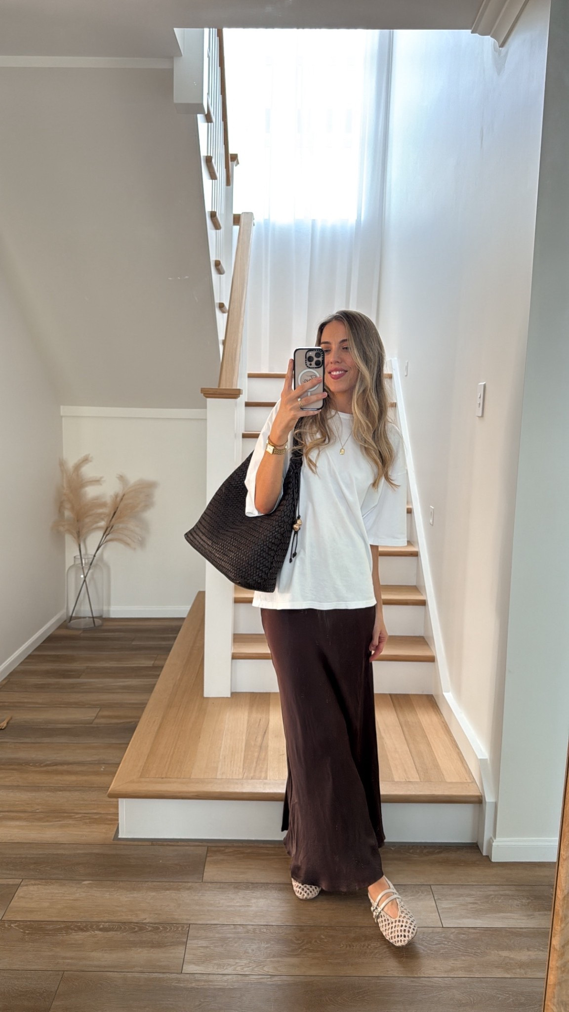  Relaxed styling 🤎 

Maxi satin skirt and an oversized tee is an easy throw on outfit that is super on trend! Add some mesh ballet flats and a woven hobo bag and you’ve got one sophisticated outfit. 

Wearing size 6 in the skirt and tee! 

#LTKsummer #LTKaustralia #LTKstyletip