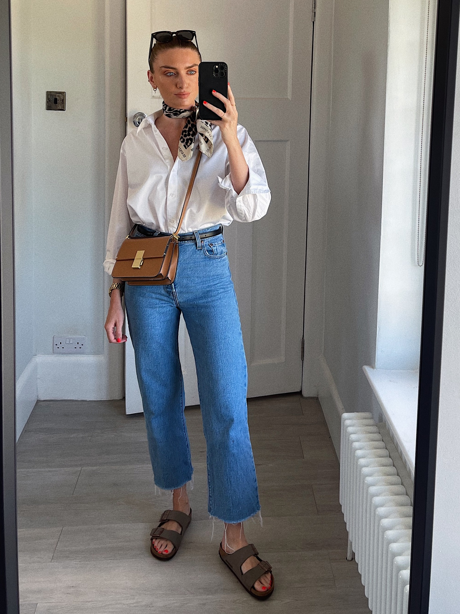 White & other stories cotton shirt (wearing a size 38) 
Levi’s ribcage straight ankle jeans in the shade ‘jazz pop - blue’
Wearing a W26 L27, I’m 5ft 6 