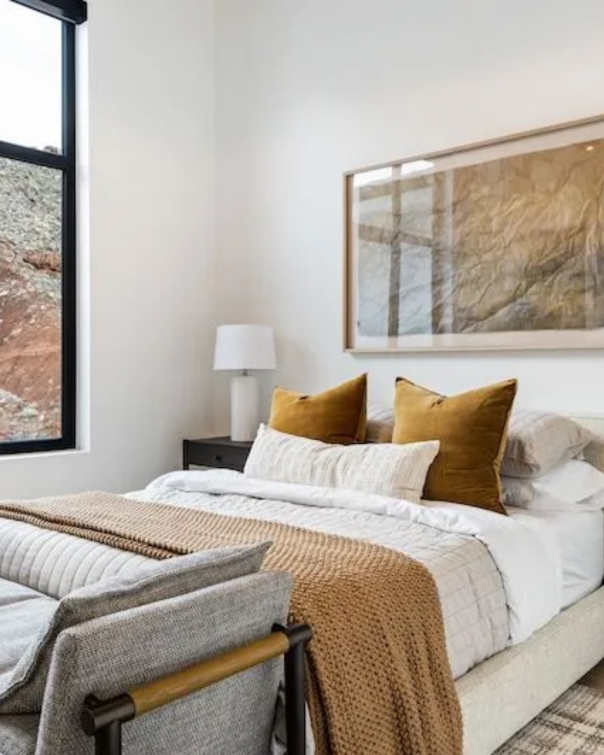 Designed by Becki Owens. Warm fall bedroom and decor. Best bedroom set. Upholstered and a slipcovered bed! Easy to clean bed frame. Luxurious bedroom. Warm and cozy bed. Neutral tones. Burnt orange pillow. Brown and green wall art. Oversized art. White quilt. Best and softest sheets. White marble table lamp. Large knit throw blanket. Area rug for Queen or king bed frame  

#LTKSeasonal #LTKhome #LTKsalealert