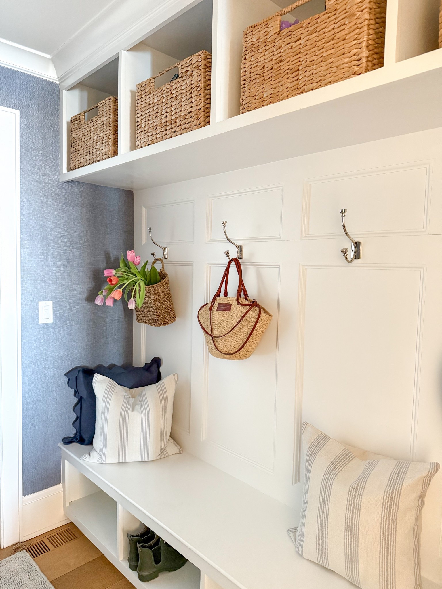 Mudroom entryway spring styling! Love having upper baskets to tuck away hats, gloves and things for all seasons! 



#LTKHome #LTKItBag