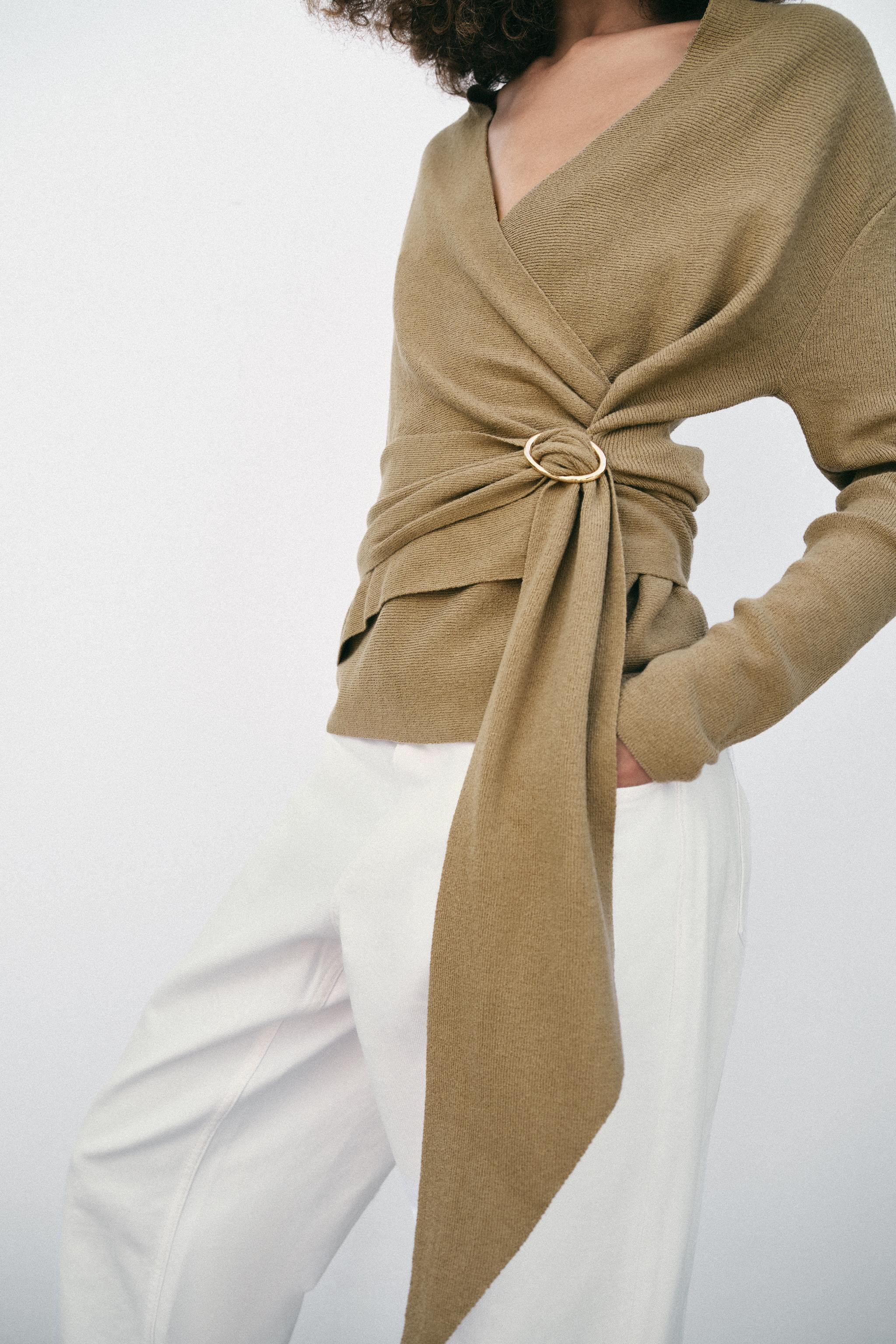 V-neck, long-sleeve cardigan. Wrap-front closure with a matching fabric tie and gold-tone buckle. | Zara US