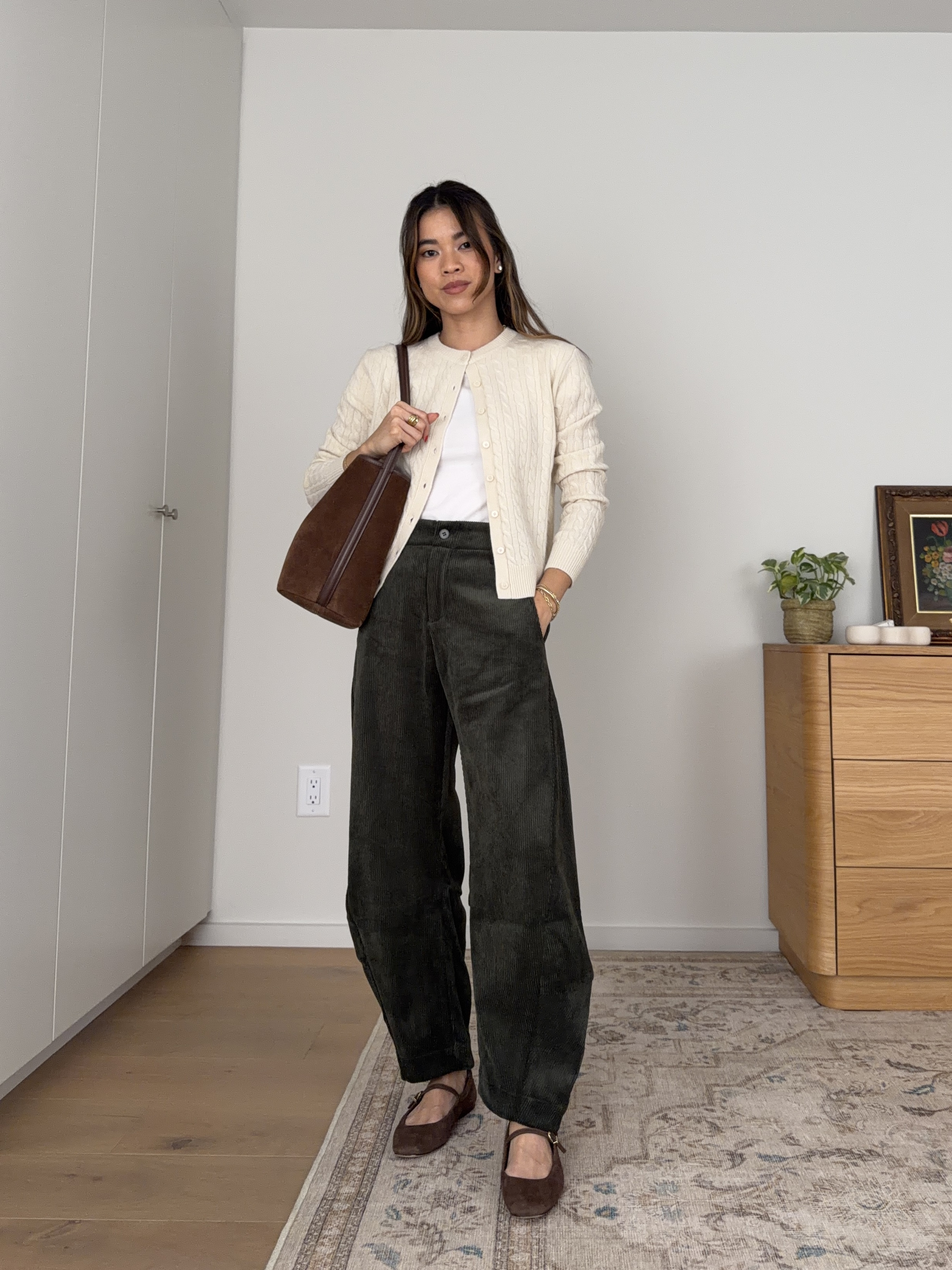 Obsessed with these @Ruti pants! 

Sizing info: 
 -Aritzia HomeStretch™ Rib Tune T-Shirt (Size XS in white) 
-Aritzia Wool Cashmere Noteworthy Cardigan (Size XS in Seaside Cream) 
-Ruti The Uptown Loose Barrel Corduroy Pants (Size 2 Regular in Elm) 

petite pants, green petite pants, fall pants, summer pants, barrel pants, winter pants, fall outfit, vacation outfit, travel outfit, best petite pants, petite barrel pants, comfy pants, viral barrel pants, fall outfit, petite fall outfit, corduroy pants

#LTKootd #LTKSeasonal #LTKPetite