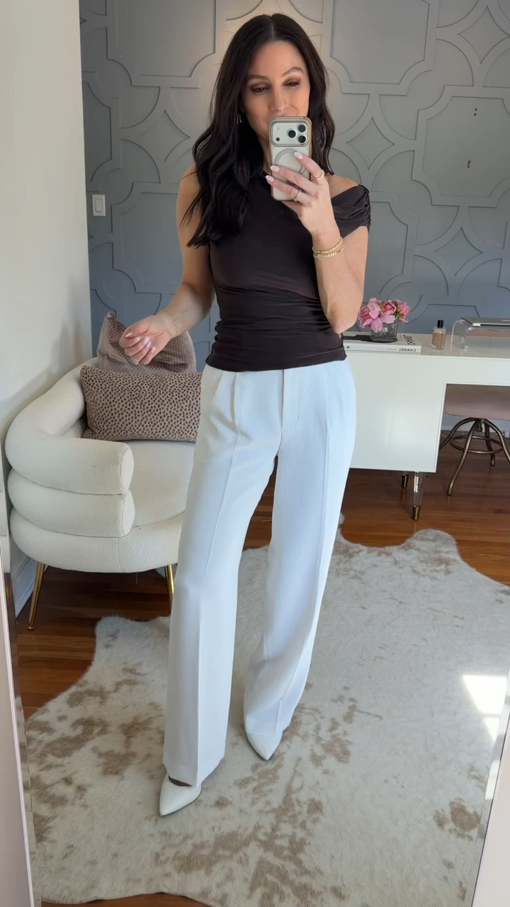 This asymmetric one-shoulder top adds an unexpected edge to classic white trousers — date night ready. True to size in both pieces.

Aritzia Summer 2026 • Stylist Picks • Elevated Workwear 

 #LTKootd #LTKSeasonal #LTKOver40