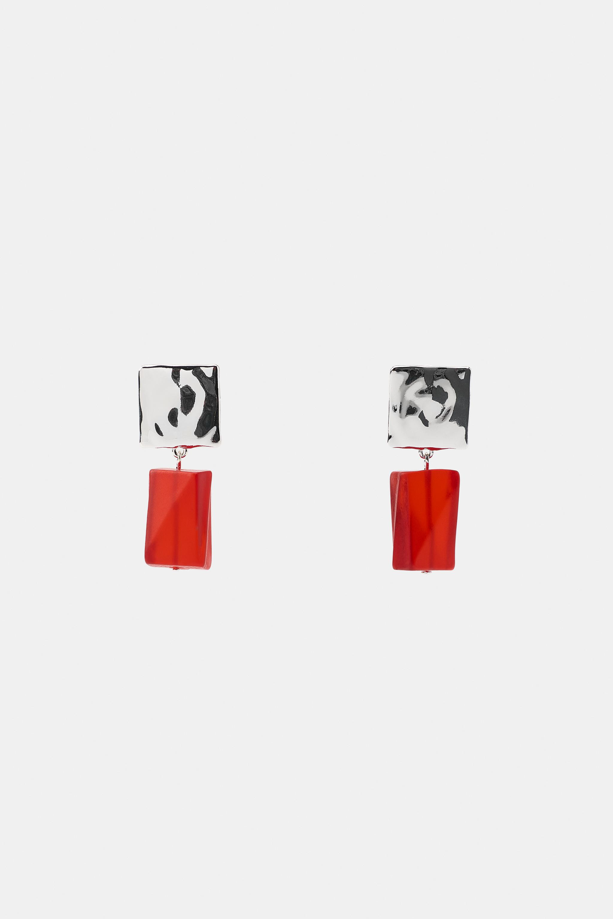 Square-shaped stud earrings in engraved metal. Features a contrasting colorful resin pendant. But... | Zara US