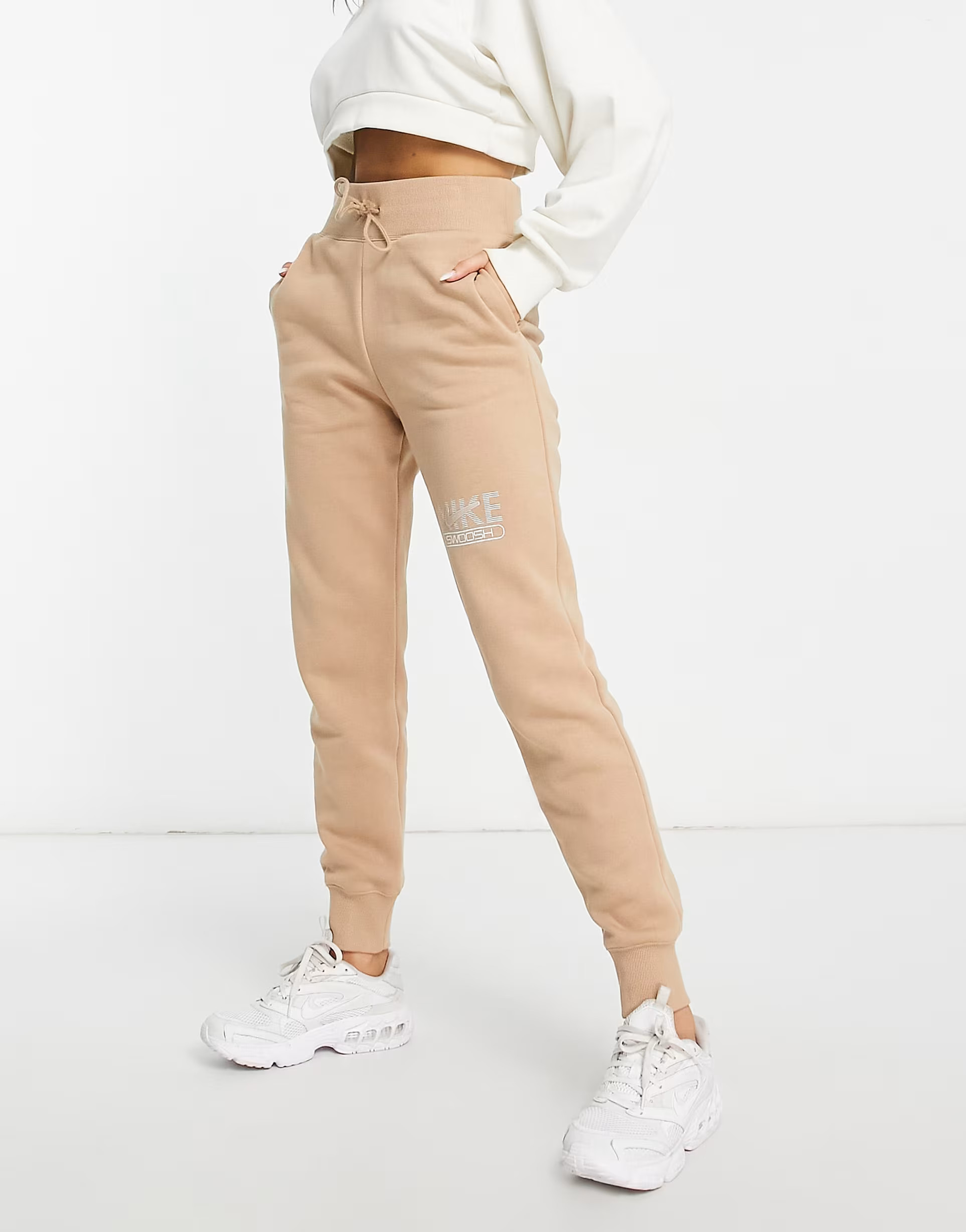 Nike Swoosh fleece joggers in brown | ASOS (Global)