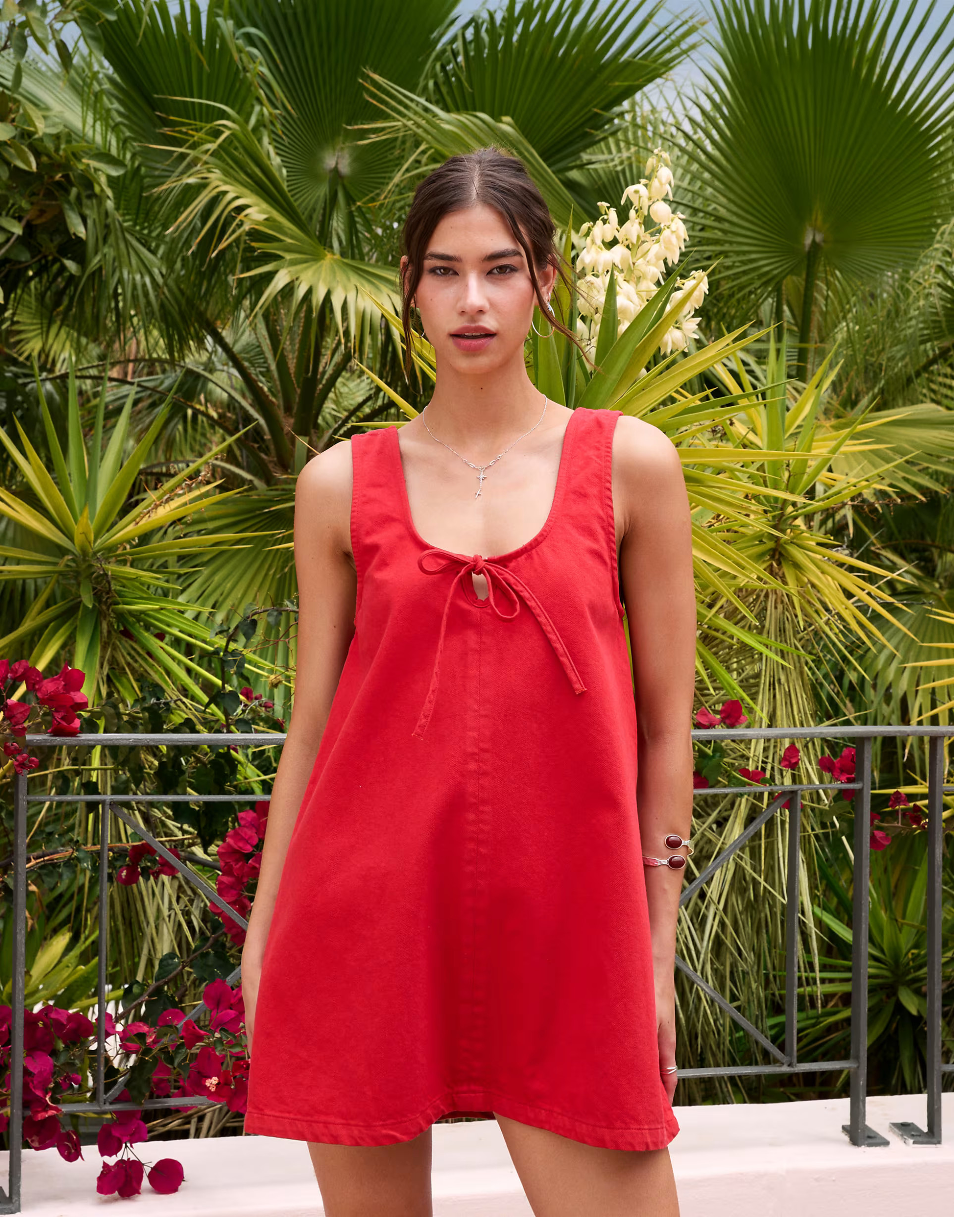 ASOS DESIGN denim scoop mini dress with bow front in red | ASOS (Global)