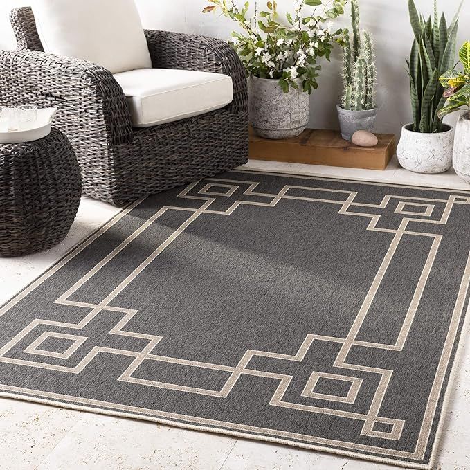 Artistic Weavers Prosperie Solid Border Outdoor Area Rug, 5 ft 3 in x 7 ft 7 in, Black | Amazon (US)