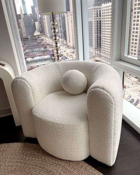 Crate and barrel swivel chair, Amazon ball pillow, target floor lamp, Boucle chair, home decor, furniture inspo, city living, city chic, Chicago style, urban trends, 2023 interior design 

#LTKhome #LTKstyletip #LTKSeasonal