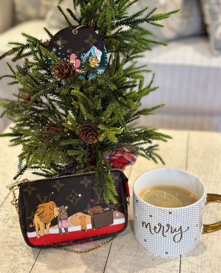 Feeling Festive with my LV Christmas Animation Mini Pochette and Bag Charm. Also loving my new mug from @sweethomedecor. 

#LTKSeasonal #LTKitbag #LTKGiftGuide