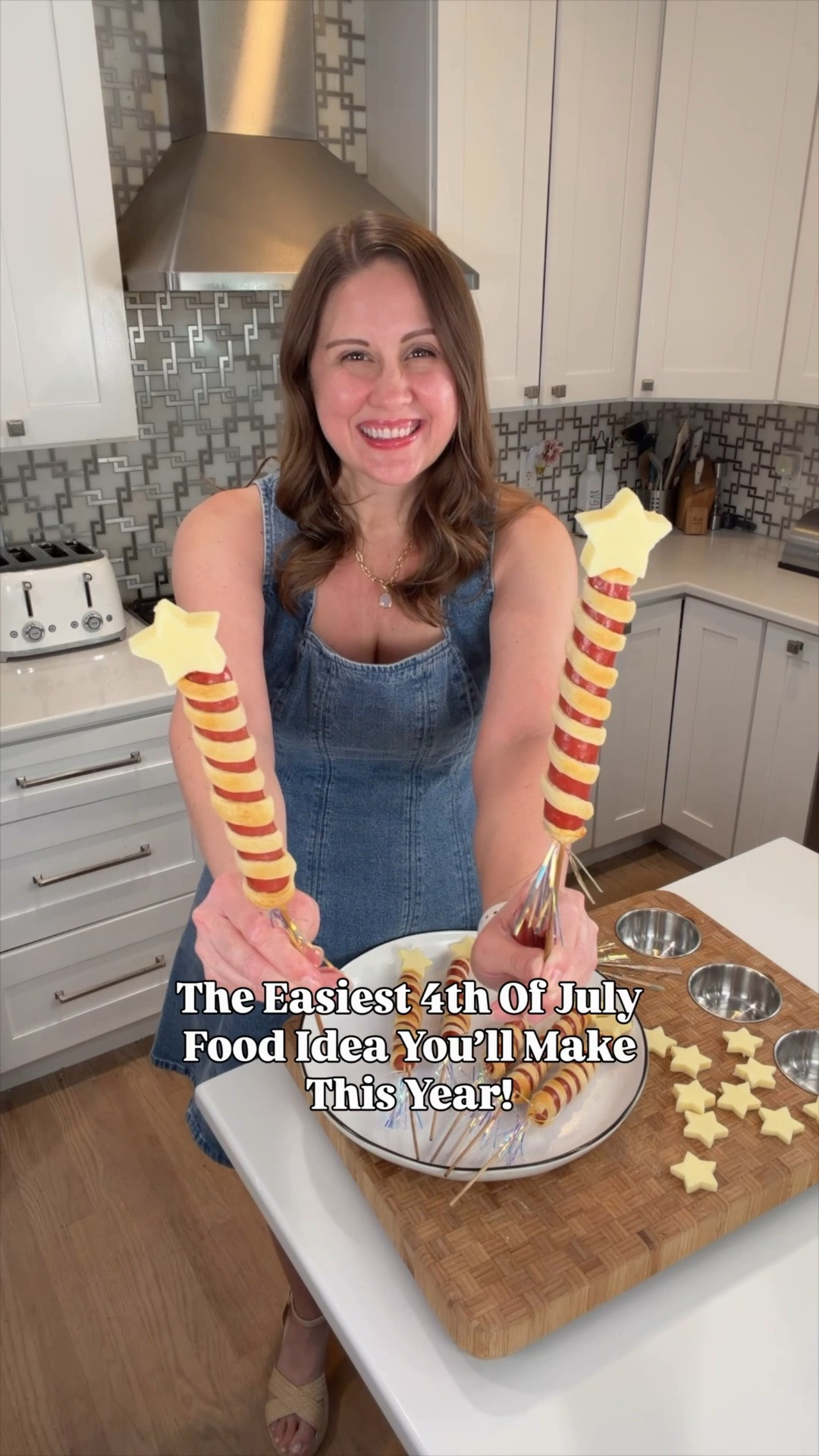 💥🌭 Save this idea for your 4th of July party! These Firecracker Hot Dogs are guaranteed to be the first thing to disappear from the table! 🇺🇸✨

Start by drying off your hot dogs and placing them on skewers. Wrap crescent roll strips around each one (a pizza cutter makes this so quick and easy! 🙌), then bake until perfectly golden brown. Add a star-shaped cheese topper ⭐️ and festive cupcake picks at the bottom to make them look like they’re ready for launch! 🚀

They’re fun, festive, kid-approved, and the perfect addition to any backyard BBQ or fireworks watch party. ❤️🤍💙

#LTKFamily #LTKParties #FourthOfJulyFood #PatrioticPartyIdeas #BBQFoodIdeas #SummerPartyFood #EasyPartyRecipes #HotDogRecipes #FourthOfJulyParty #RedWhiteAndBlueFun

#LTKSeasonal #LTKfoodie #LTKHome