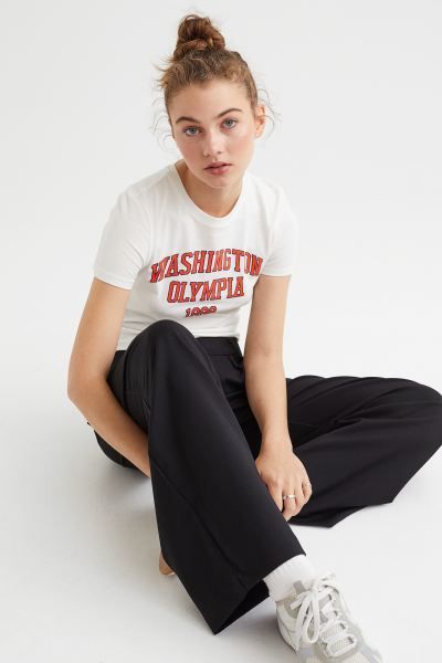 Conscious choice  Wide, twill trousers in a relaxed fit with a low waist, extended waistband with... | H&M (US + CA)