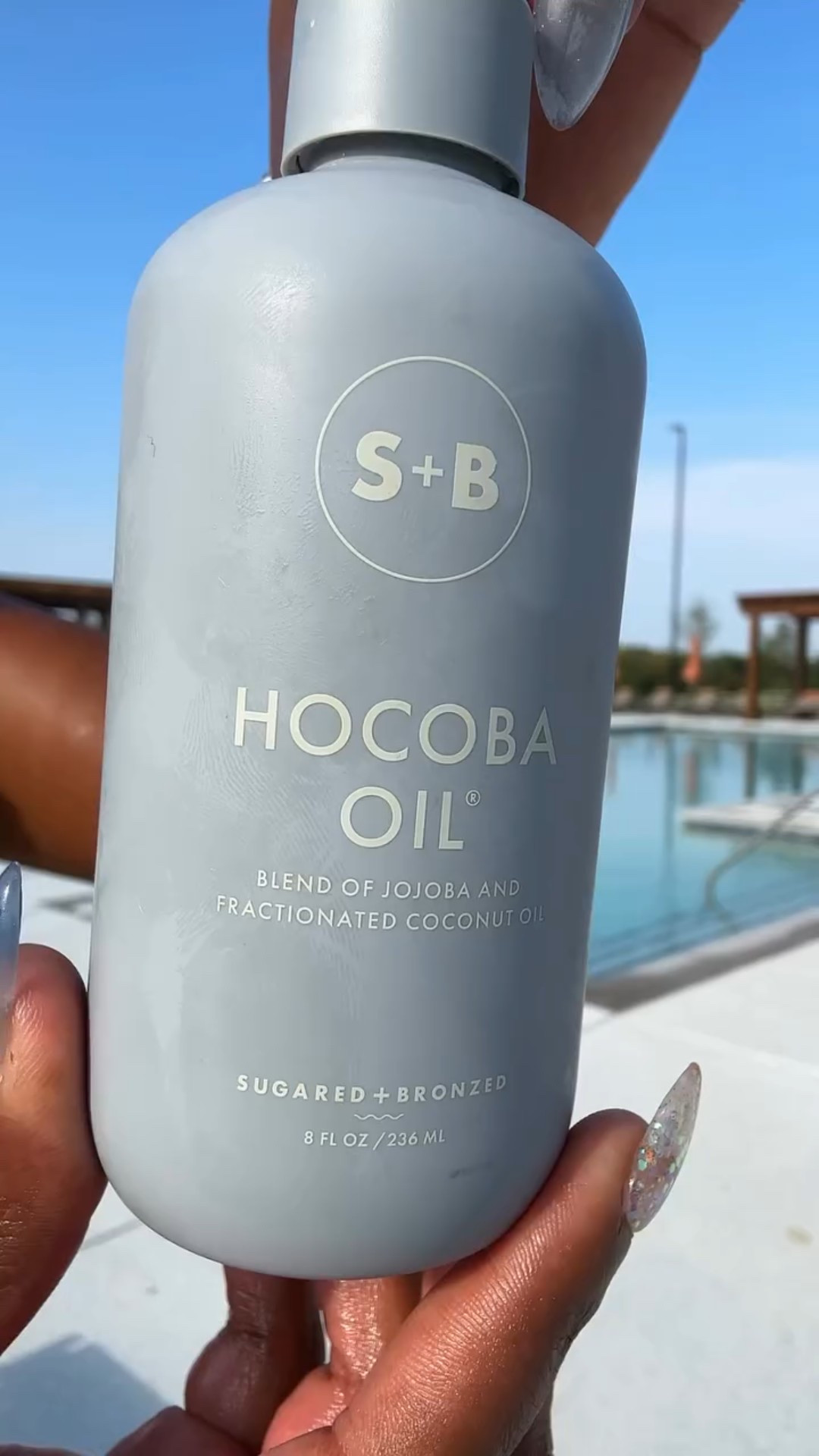 Poolside but still making it self-care💁🏾‍♀️ 💦✨ Hocobo Oil from @sugaredandbronzed is my go-to for soft, glowing skin.

Benefits of Hocobo Oil 🌿✨
🌞 Keeps skin hydrated + glowing
🧴 Lightweight, absorbs fast (no greasy feel)
💧 Balances + locks in moisture
🌸 Soothes + nourishes sensitive skin
💪🏾Helps strengthen skin barrier
✨ Perfect post-sun or post-shave care

#abikinikindalife #dallasinfluencer #beautyinfluencer #modelinthemaking #texasinfluencer #dfwinfluencer #hudabeauty