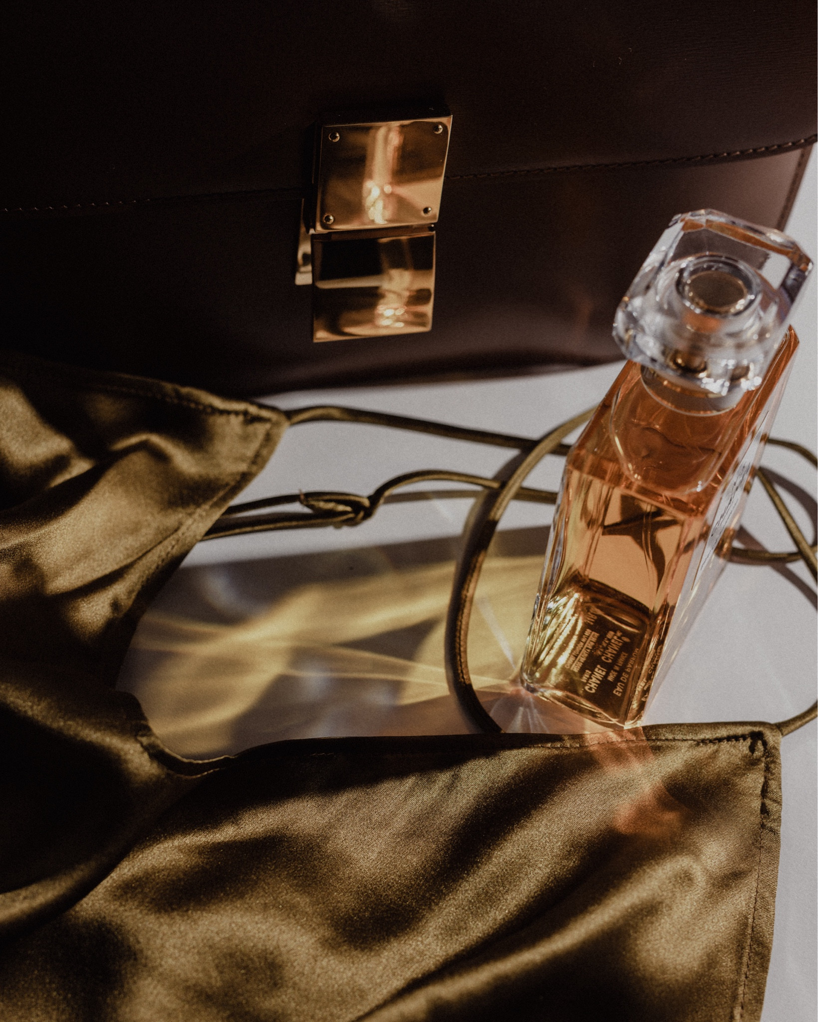 NYE party essentials: a gorgeous dress, classic purse and a statement perfume. 
Mine are: a slip dress, a classic box bag by Celine and Chanel Number 5 Eau Premiere. What are yours? 

#LTKstyletip #LTKHoliday #LTKitbag