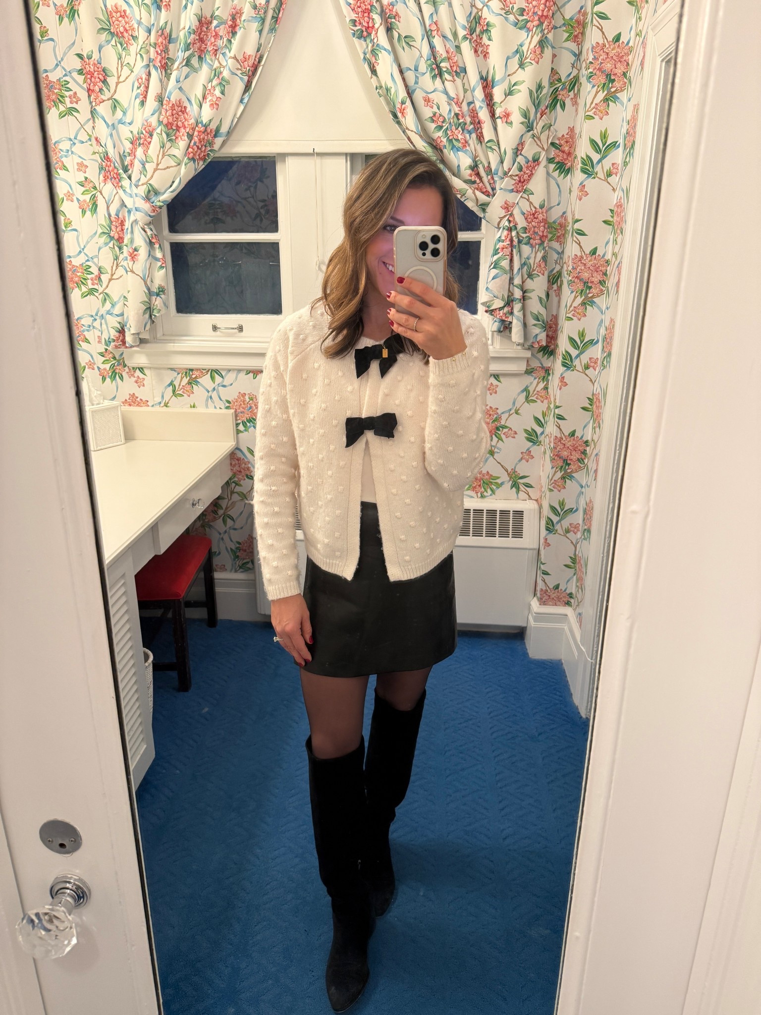 Christmas outfit, Christmas Eve, winter outfit, date night, classic style, black and white, black boots, leather skirt, ivory sweater, bow sweater

#LTKSeasonal #LTKootd #LTKHoliday