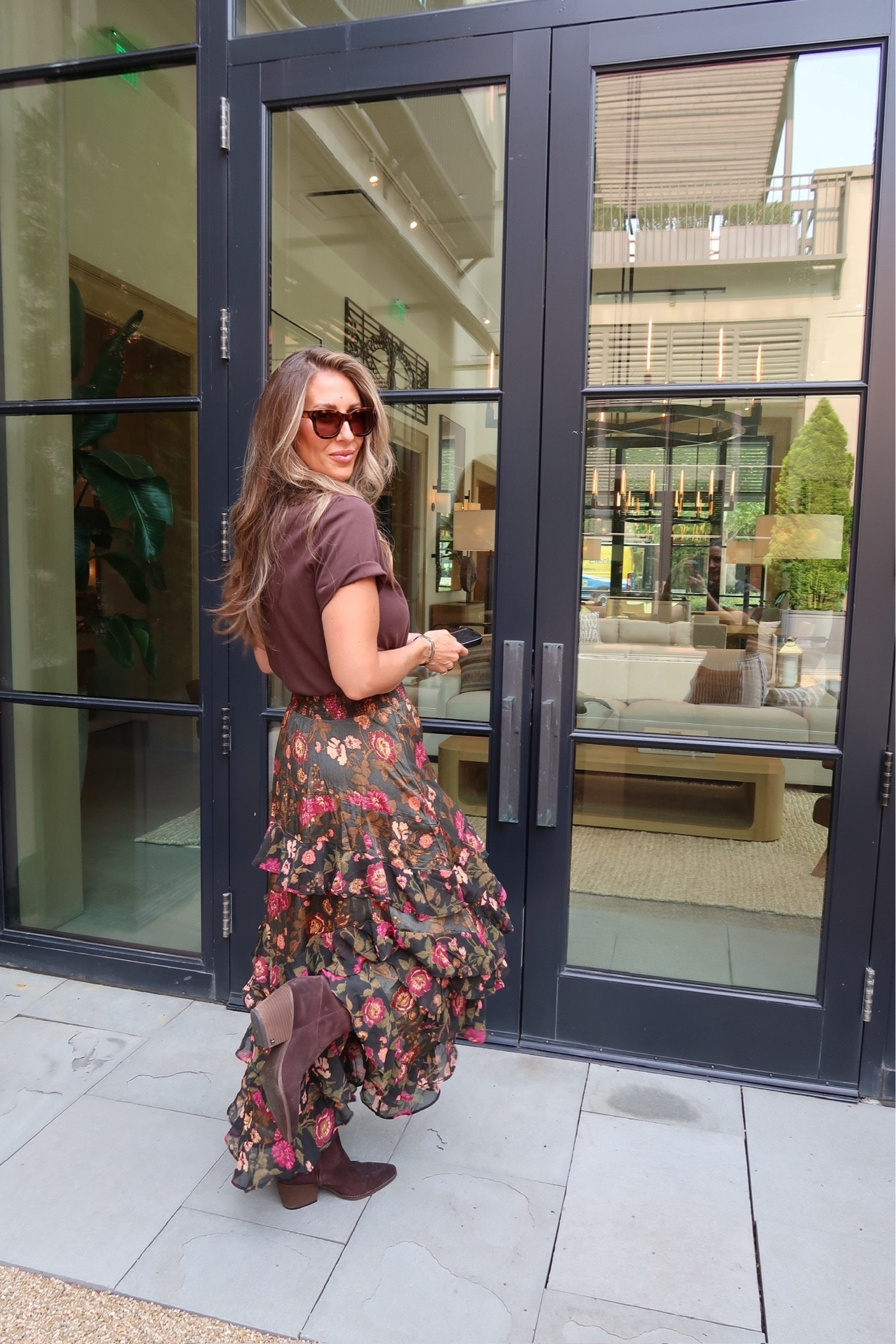 This skirt is even prettier in person. The rich floral print, layered ruffles, and chocolate brown boots make it feel like the perfect way to ease into fall without giving up dresses just yet.

floral maxi skirt, fall transition outfit, brown boots, western inspired style, feminine outfit, floral print, date night outfit, early fall fashion, neutral top, women’s style, TheMomInStyle

#LTKootd #LTKOver40 #LTKmomlife