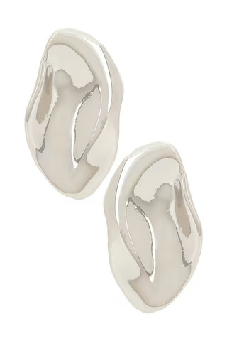 Casa Clara Mahina Earrings in Metallic from Revolve.com | Revolve Clothing (Global)