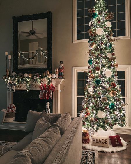 Christmas living room decor. Christmas decor. Christmas tree. Nutcracker Christmas theme. Nutcracker Christmas decor. Christmas fireplace. Garland. 

#LTKGiftGuide #LTKhome #LTKCyberWeek