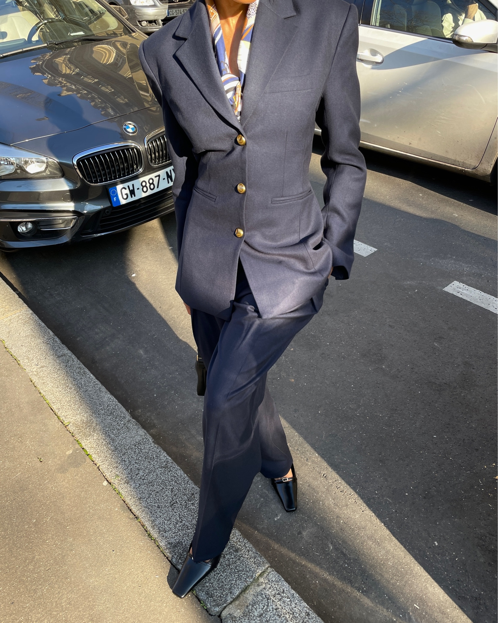 A chic navy suit with cinched waist. Add a silk scarf around the neck for a feminine touch that will instantly elevate the look. 

#LTKstyletip