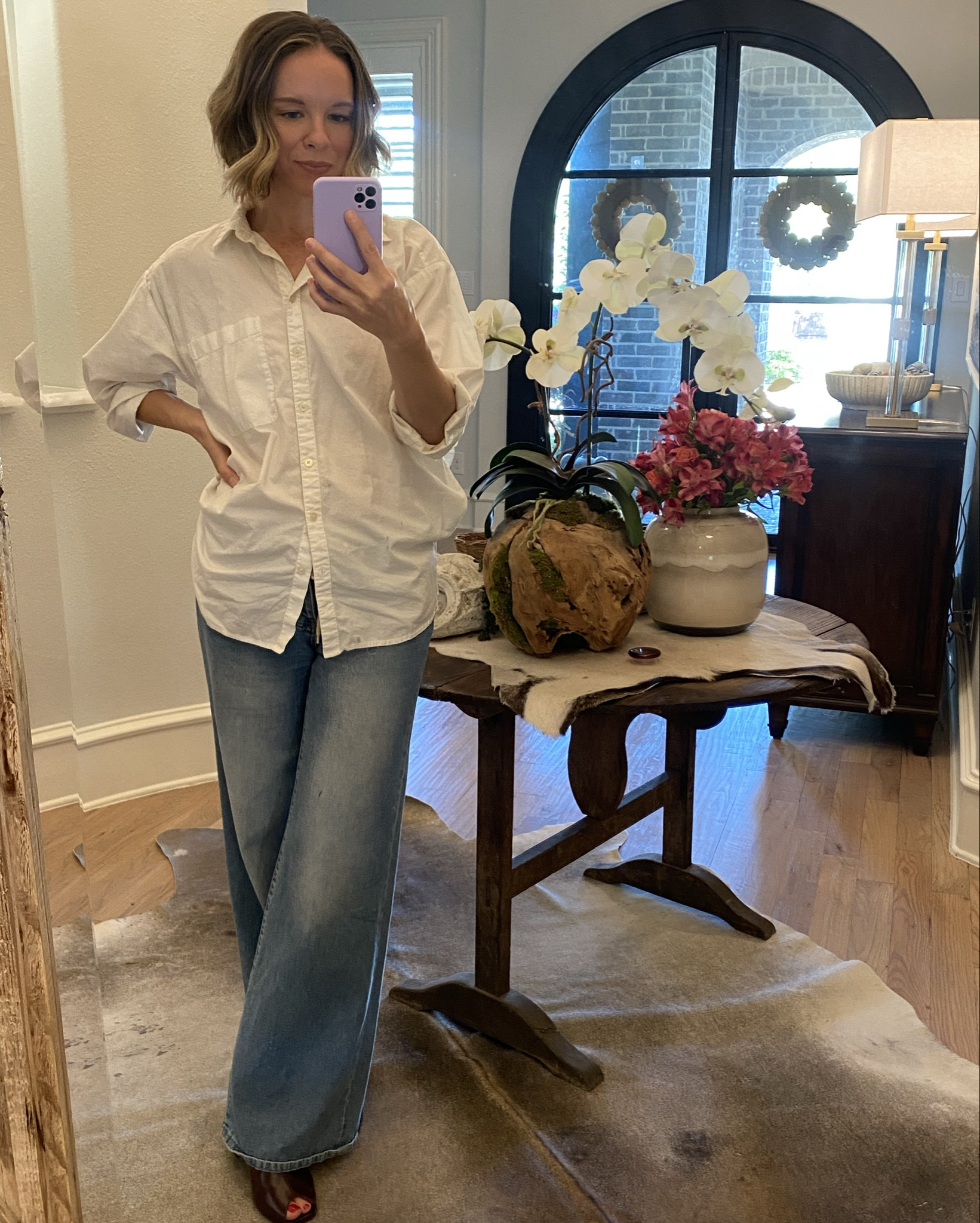 The easiest pre-fall look that probably already exists in your closet. A simple white button up shirt, a pair wide-legged jean, and gorgeous leather mules. Easy-peasy. 👖🍁 SHIRT AND JEANS ARE MARKED DOWN! 

#LTKStyleTip #LTKSeasonal #LTKSaleAlert