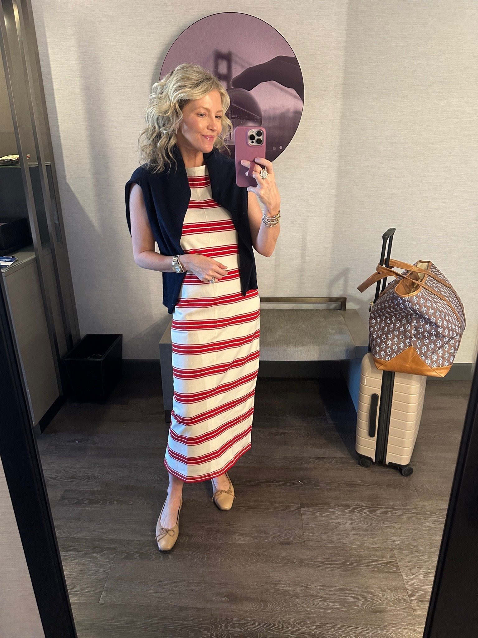 Dress is 50% off and in stock in all sizes!!  I’m wearing an XS. I have a medium in the cashmere sweater.