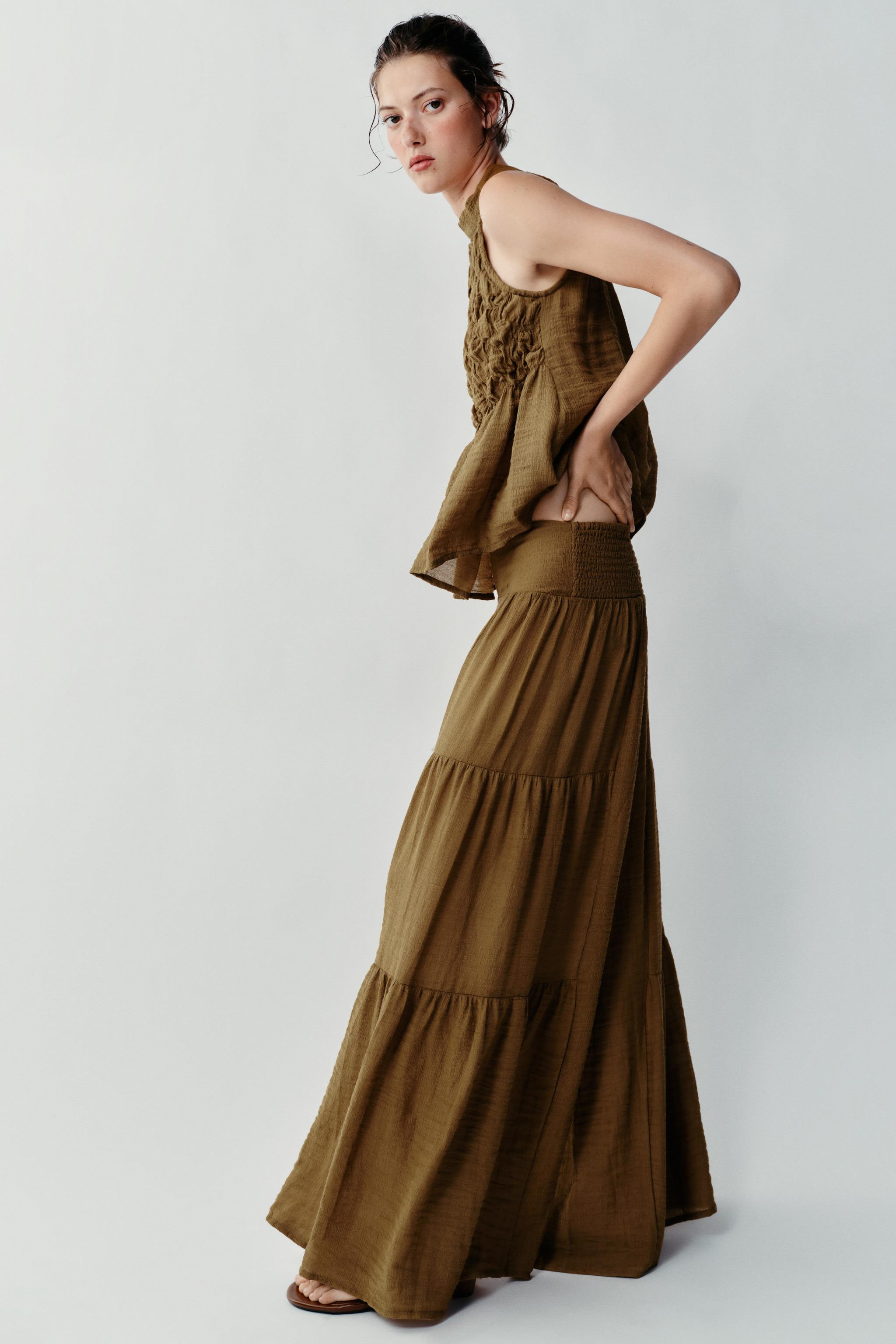 Halter neck top with ruching. Back opening with hidden button closure. | Zara US
