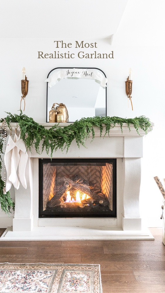 I bought another garland so this is what two of them look like together!
They really are the most realistic garland I've found. 
I draped it along my mantel with 3 Command Strips. Shop here for the garland and bells!

#LTKHome #LTKSeasonal #LTKHoliday