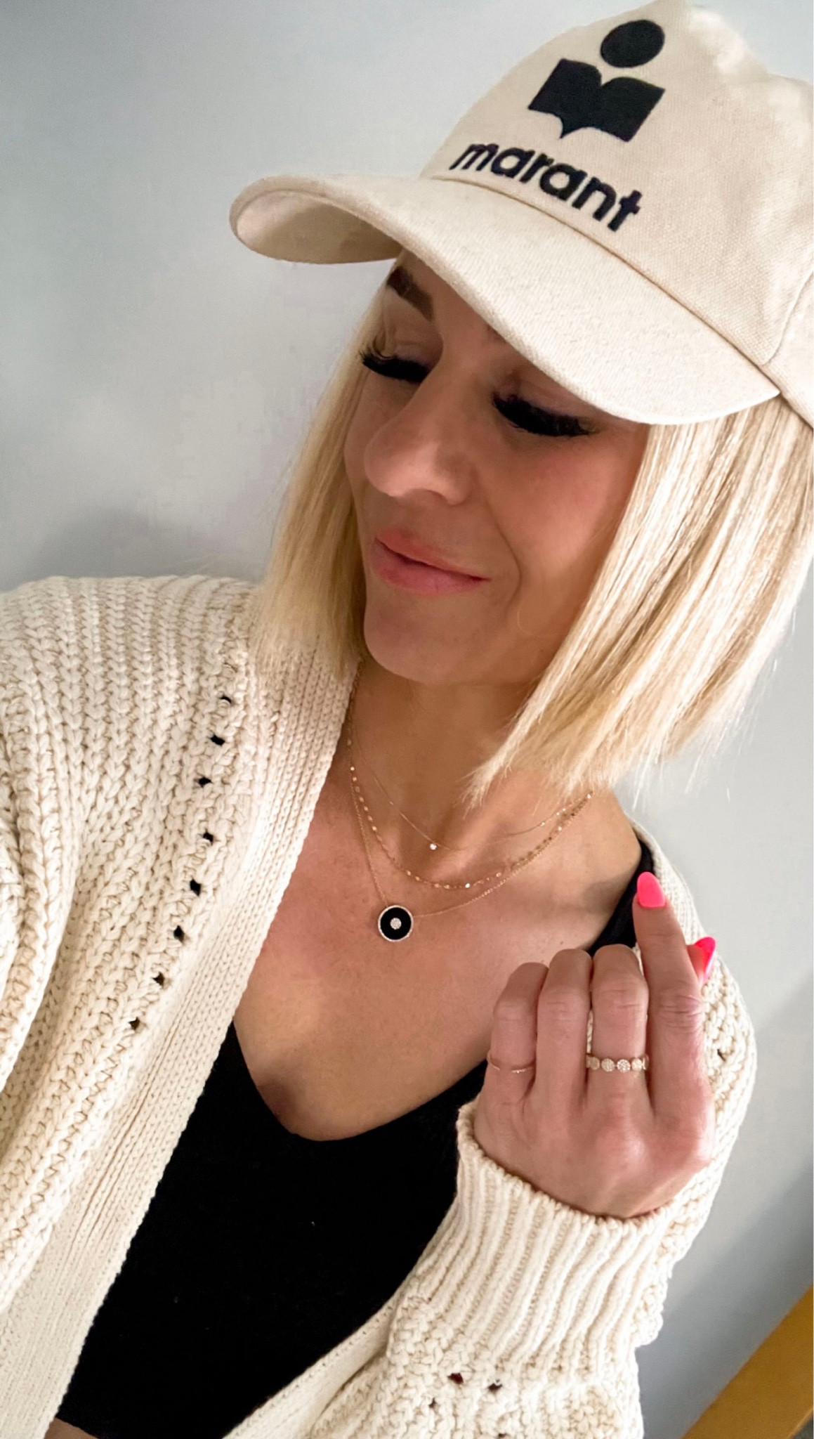 Black cami tank, chunky knit cardigan that’s perfect for cool spring mornings & evenings, isabel marant baseball hat. 
For fine jewelry: DM on INSTAGRAM @bethanybrost





Gifts for mom, Mother’s Day 

#LTKGiftGuide #LTKSeasonal #LTKunder50