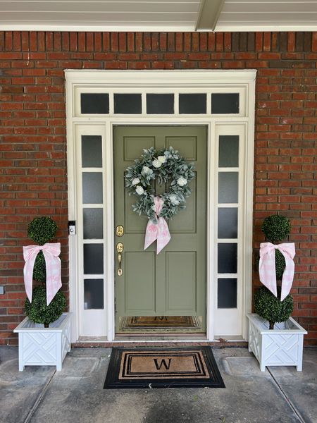 Porch entryway decor

Topiaries pink buffalo check wreath sash bows white chippendale planters doormat monogrammed preppy grandmillennial 

#LTKhome #LTKunder50 #LTKFind