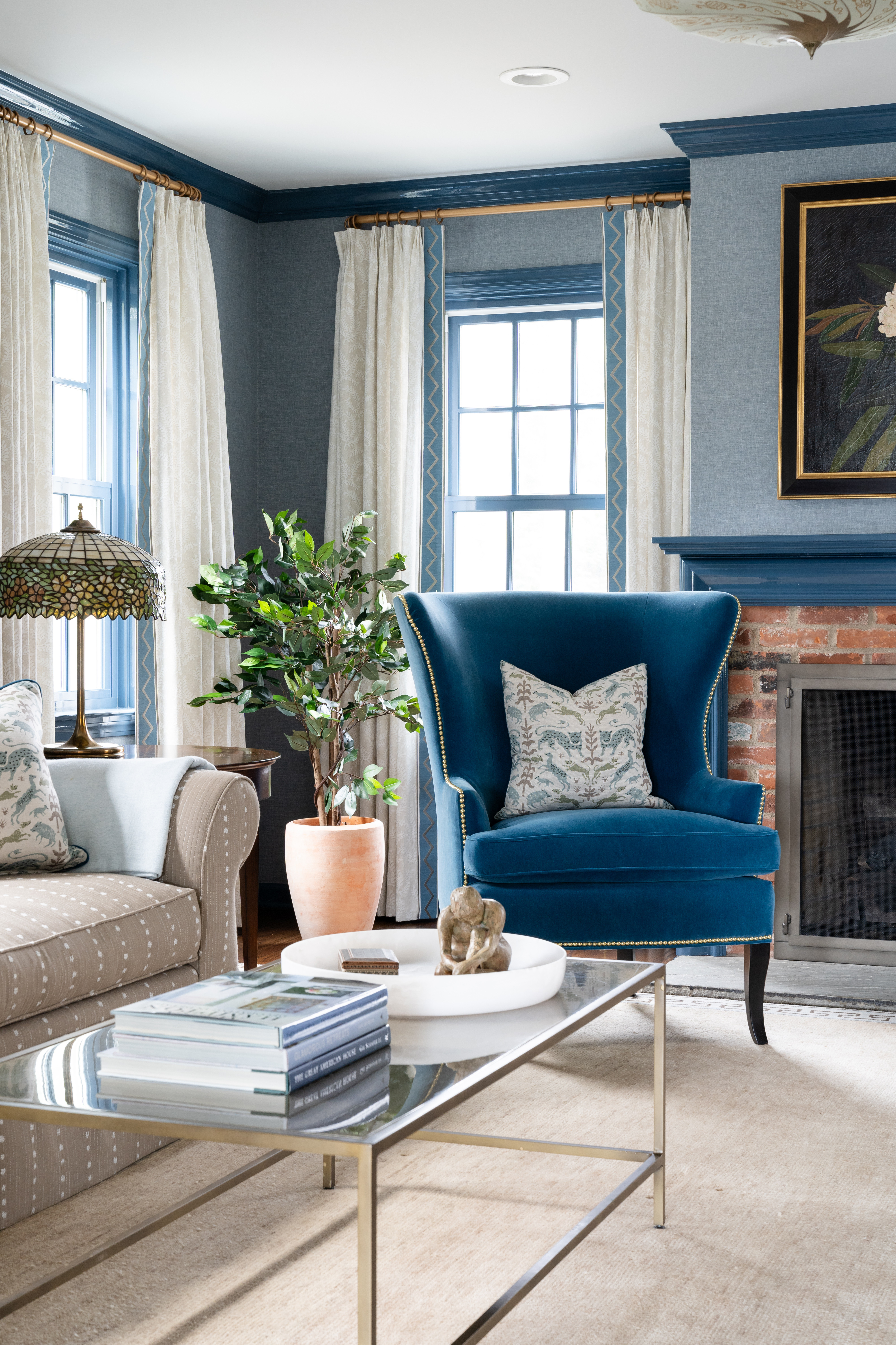 As the weather gets colder and we begin to retreat indoors, it's important to have cozy spaces like this one 💙 A beautiful fire place and gorgeous blue walls set the perfect backdrop for this living room. We could curl up here with a book for hours! 

 

#LTKSeasonal #LTKHome #LTKStyleTip