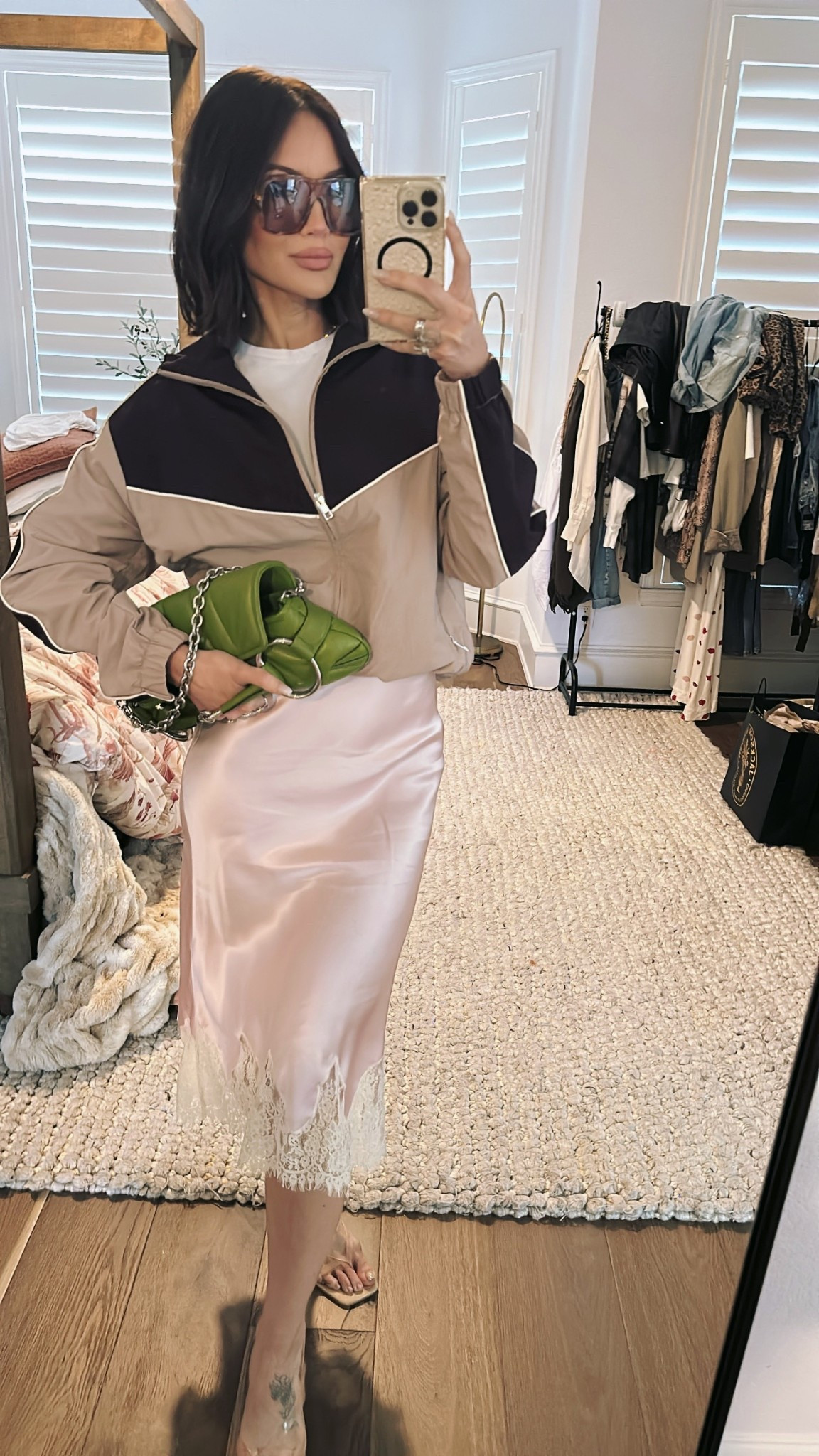 Love the fun juxtaposition of a feminine silk skirt and a sporty jacket. Linked the same second hand Gucci clutch I scored. @Reformation 

#LTKdayinmylife #LTKgrwm #LTKootd