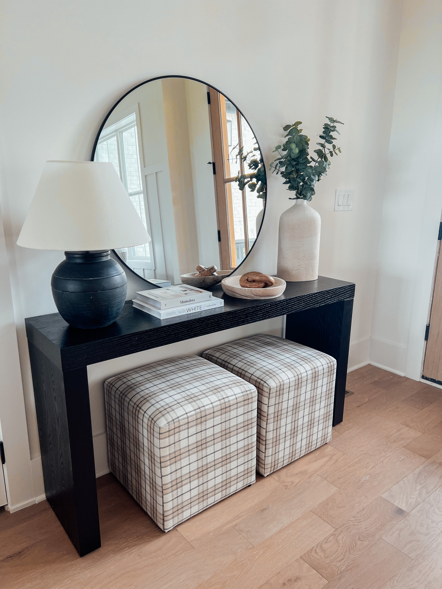 Option 2 Fall Studio MeGee Ottoman With Entryway Table Decor ✨

Plaid ottoman | fall entryway decor | black modern entryway table | entryway lamp | tall ceramic vase | black round entryway mirror | wooden knot | home decor books | coffee table books | modern entryway decor | faux eucalyptus stem#LTKhome

#LTKSeasonal