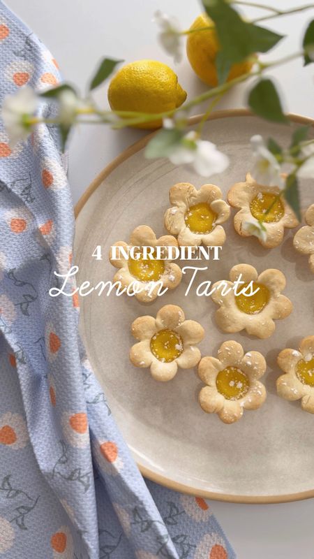 LEMON TARTS 🍋

1 Box Pie Crusts
1 Box Lemon Bar Mix
3 Eggs
1/2 cup water
1 tsp Lemon Zest
Powdered Sugar

Directions:

1.  Preheat oven 375º.  Unroll pie crust & use flower cookie cutter to cut flower shapes out of dough.
2.  Place flowers into mini muffin tin & press down gently to form a cup.
3. Mix lemon bar mix, eggs, water & lemon zest.  Pour into flower cups.
4.  Bake for 13-15 minutes or until lemon is set and edges are golden.
5.  Sprinkle with powdered sugar.

#LTKhome #LTKVideo #LTKfamily