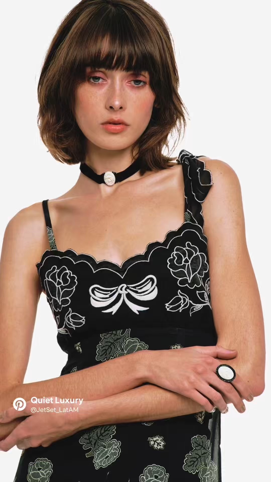 This black slip dress by Anna Sui is one of those pieces that feels both dreamy and effortless the moment you put it on. Designed with delicate straps, a scalloped sweetheart neckline, and soft floral embroidery at the center, it has that signature romantic elegance Anna Sui is known for. The lightweight chiffon drapes beautifully around the body, creating an ethereal, flattering silhouette that moves with you instead of against you.

What I love most is how versatile it is — wear it on its own for an evening out, layer it with a cardigan or blazer for day-to-night styling, or pack it for travel when you want something easy but elevated. It’s feminine without being fussy, romantic without feeling costume-y, and polished enough for special occasions while still feeling wearable.

If you’re looking for a timeless black dress with soft movement, subtle detail, and a quietly luxurious feel, this one is worth bookmarking.
✨ Linked on LTK for easy shopping.


#LTKWedding #LTKootd #LTKdayinmylife