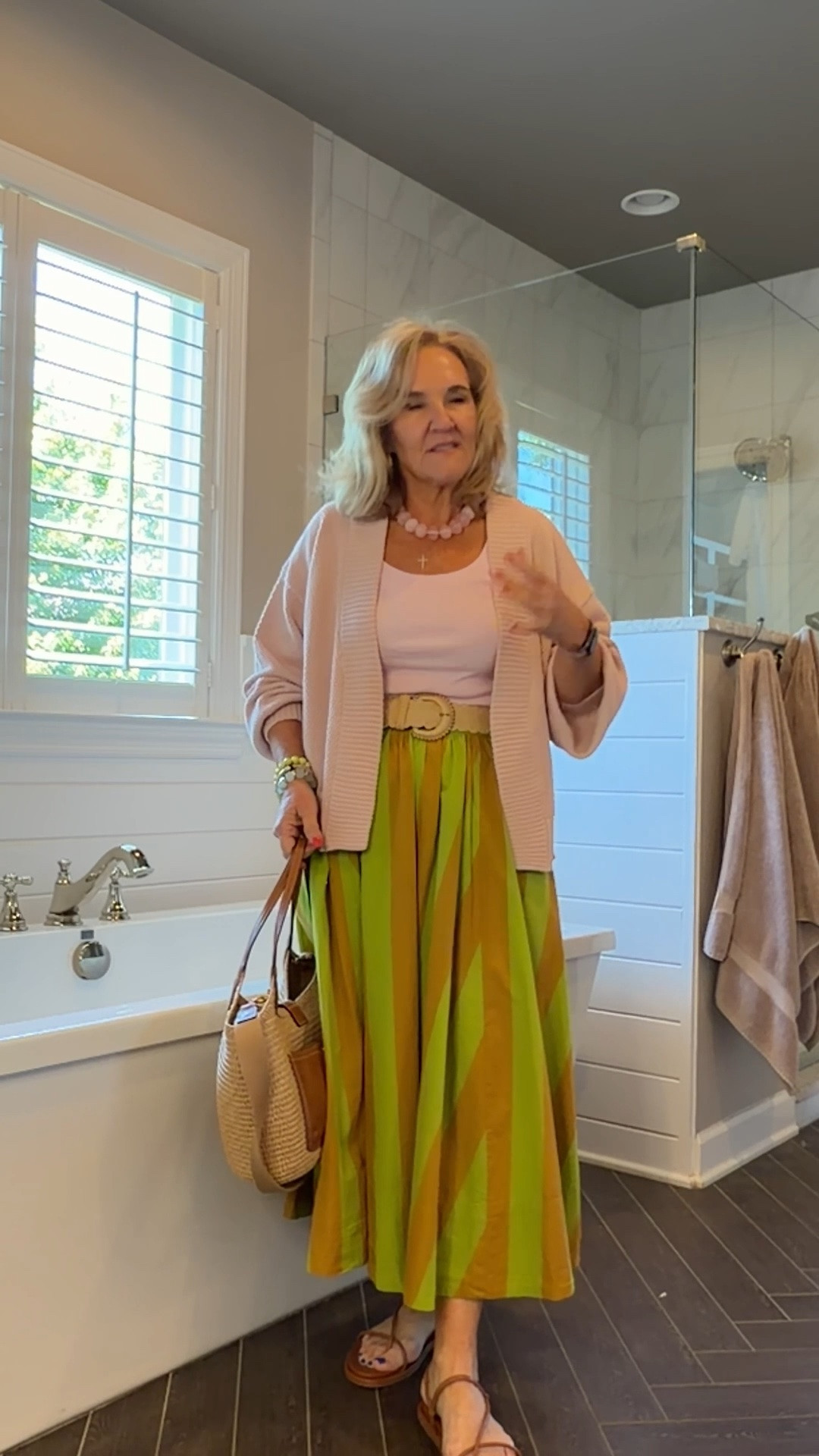 Tank size medium I’ll link the Amazon one too but the free people fabric is so much better 
Skirt size small 
Sweater is lovely I’m in a medium and it is a bit oversized. You decide if you want to size down. Get whatever colors are available. Pink is selling fast! I’ve link another good option. 
20% off my bracelets code NANETTE20
10% off my bag code NANETTE

#LTKMothersDay #LTKOver40 #LTKPetite