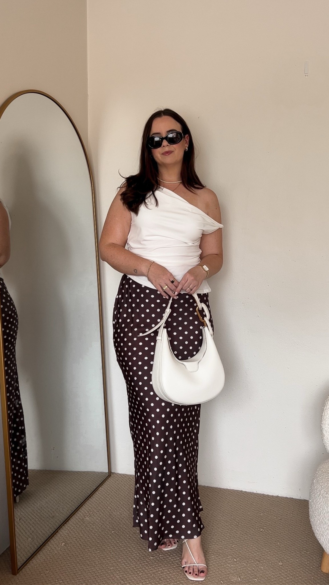 Atmos&Here white off shoulder tank: size 14
Atmos&Here polka dot skirt: size 14
Nelson Made white sandal heels
Charles & Keith bag
Celine sunglasses 

#LTKsummer #LTKmidsize #LTKaustralia
