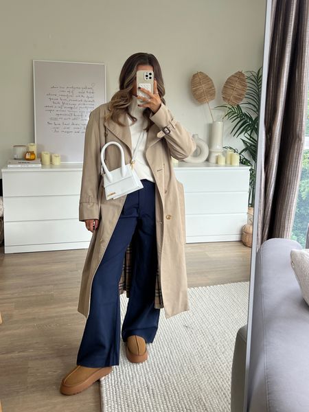 Trench coat styled with white Jacquemus le chiquito bag and navy Sloane trousers from Abercrombie, with tuckable cream jumper and ugg Tasman files - great autumn outfit. 

#LTKstyletip #LTKfindsunder100 #LTKeurope