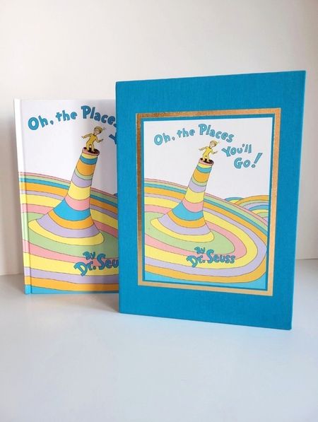 Oh, the places you'll go! By Dr. Seuss deluxe edition - this keepsake book features a cloth slip case cover (which is why I bought it) I saw a 📍on pinterest where you buy this book & have your child's teachers, coaches, anyone who helps your child along their journey in life.. they sign it & you gift it to them when they graduate 🥹 I LOVED that idea! I purchased for my babies 💛 Remember you can always get a price drop notification if you heart a post/save a product 😉 

✨️ P.S. if you follow, like, share, save, subscribe, or shop my post (either here or @coffee&clearance).. thank you sooo much, I appreciate you! As always thanks sooo much for being here & shopping with me friend 🥹 

| dr seuss, dr seuss books, oh the places you'll go, dr seuss's, dr seuss who, dr seuss oh the places you I go, the places you'll go, all the places you'll go, oh the places you'll go book, dr seuss book collection, wedding guest, dress, country concert, maternity, sandals, white dress, travel outfit, swimsuit, graduation gifts,
kindergarten graduation, college graduation, high school graduation, money lei, grad 2024, graduation
2024, graduation dress, prom, mothers day gift guide I #LTKxMadewell #LTKGiftGuide #LTKFestival #LTKSeasonal #LTKActive #LTKVideo #LTKU #LTKover40 #LTKhome #LTKsalealert #LTKmidsize #LTKparties #LTKfindsunder50 #LTKfindsunder100 #LTKstyletip #LTKbeauty #LTKfitness #LTKplussize #LTKworkwear #LTKswim #LTKtravel #LTKshoecrush #LTKitbag #тКЬаЬу #TKbump #LTKkids #LTKfamily #LTKmens #LTKwedding #LTKeurope #LTKbrasil #LTKaustralia #LTKAsia #LTKcurves #LTKbaby #LTKbump #LTKRefresh #LTKfit #LTKunder50 #LTKunder100 #liketkit @liketoknow.it https://liketk.it/4EXkY